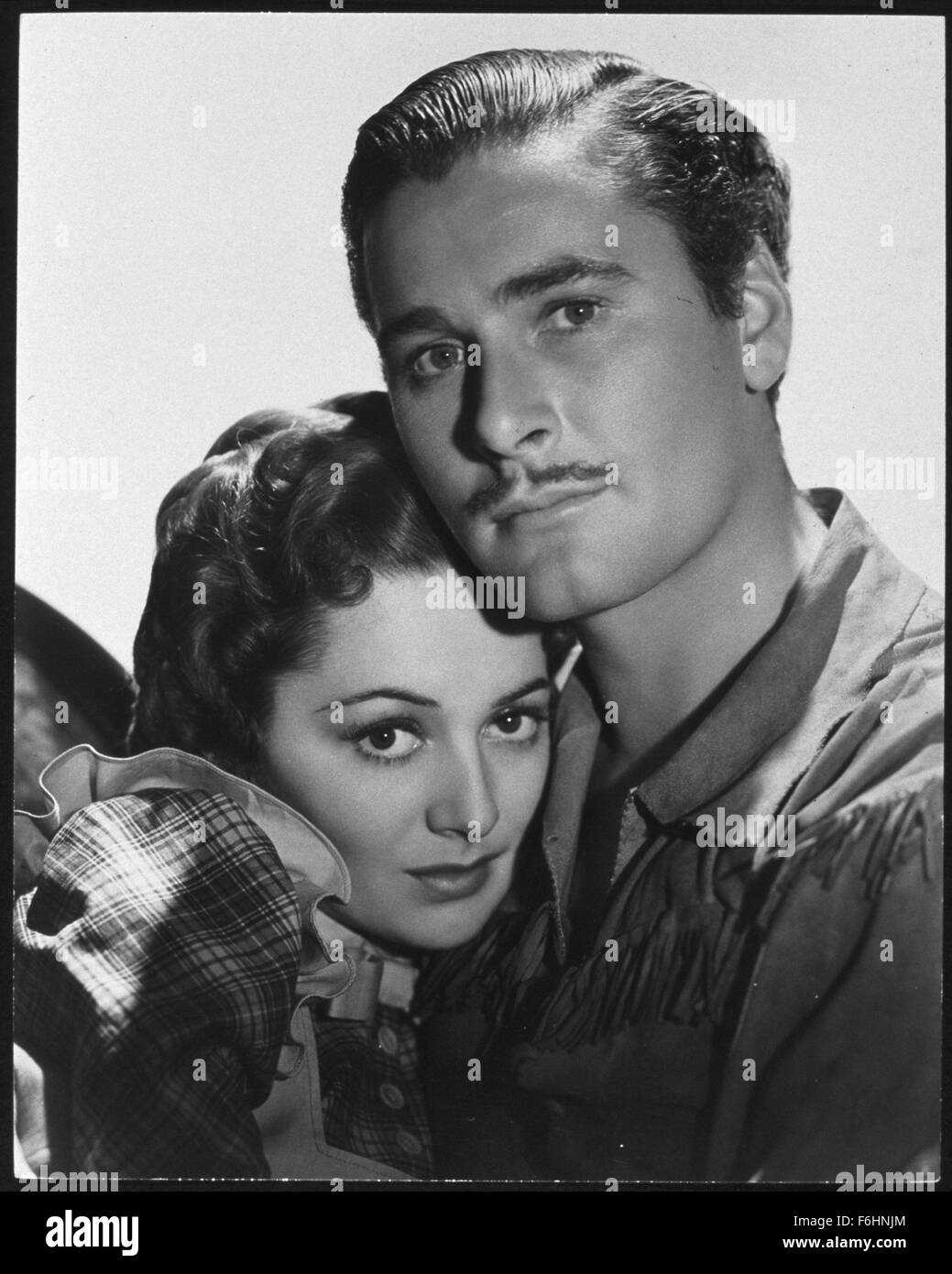 1939, Film Title: DODGE CITY, Director: MICHAEL CURTIZ, Studio: WARNER, Pictured: MICHAEL CURTIZ, OLIVIA DeHAVILLAND, ERROL FLYNN. (Credit Image: SNAP) Stock Photo