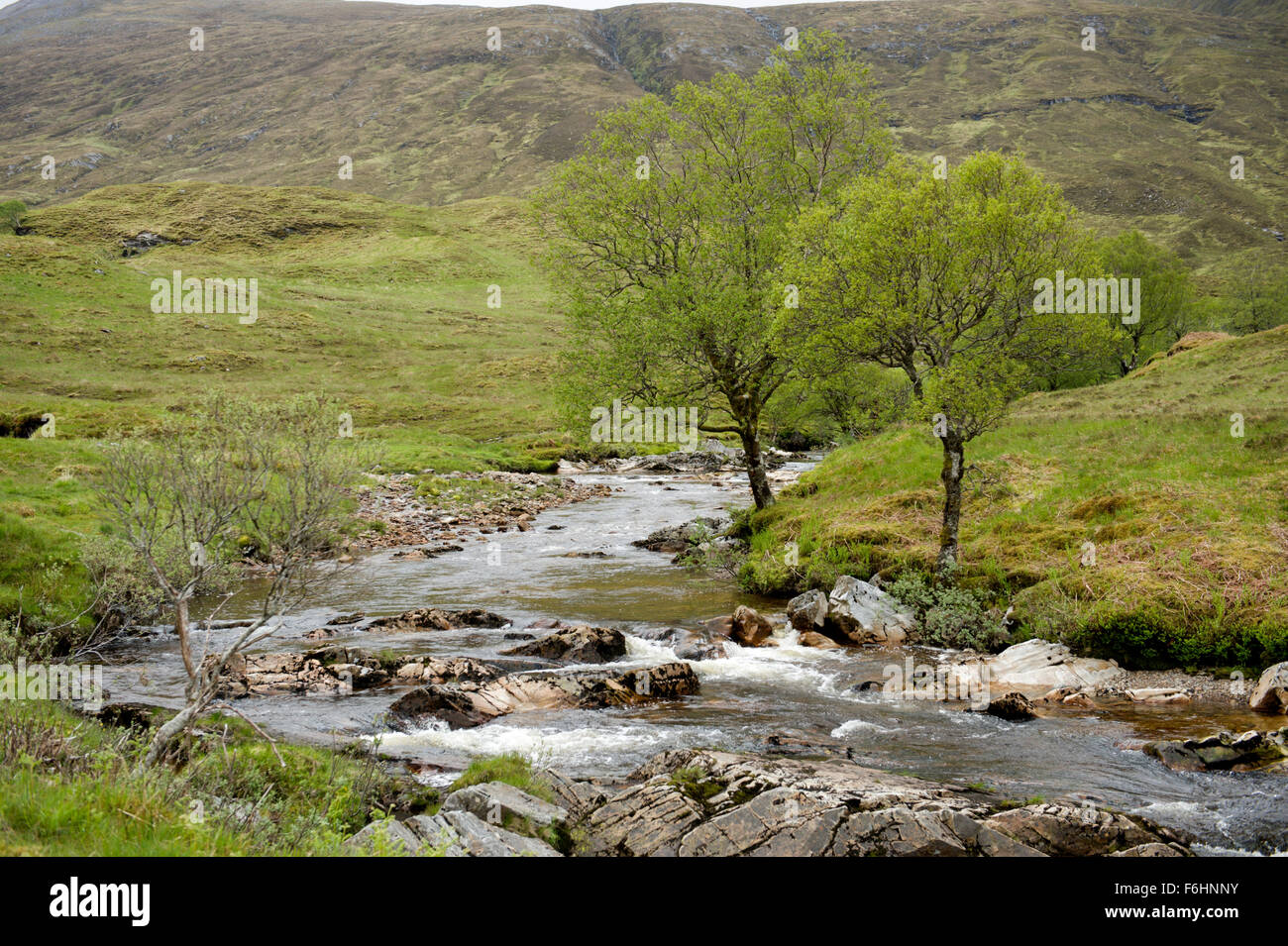 The rocky upper reaches of the Water of Nevis in Glen Nevis Stock Photo