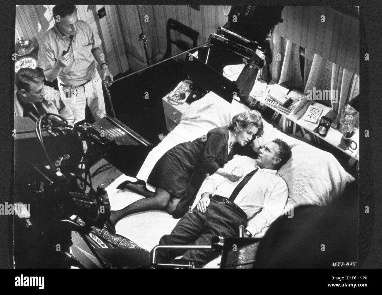 1966, Film Title: WHO'S AFRAID OF VIRGINIA WOOLF?, Director: MIKE NICHOLS, Pictured: BEHIND THE SCENES, RICHARD BURTON, DIRECTOR DIRECTS, MIKE NICHOLS, ELIZABETH TAYLOR, BEHIND SCENES, FILMING, BED. (Credit Image: SNAP) Stock Photo