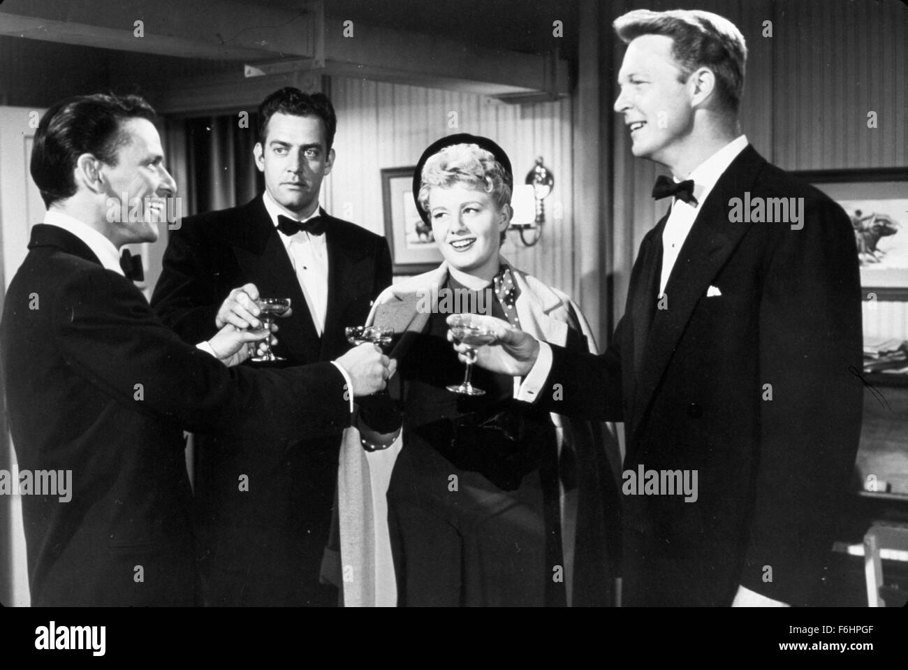 1952, Film Title: MEET DANNY WILSON, Director: JOSEPH PEVNEY, Pictured: RAYMOND BURR, ALEX NICOL, JOSEPH PEVNEY, FRANK SINATRA, TOASTING DRINKS. (Credit Image: SNAP) Stock Photo