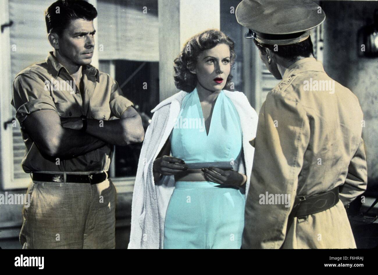 1953, Film Title: TROPIC ZONE, Director: LEWIS FOSTER, Studio: PARAMOUNT, Pictured: 1953, RHONDA FLEMING, LEWIS FOSTER, RONALD REAGAN, INTERROGATING, INTIMIDATING, OFFENDING, HUMILIATING, BELITTLING, MIDRIFF, MILITARY UNIFORM, POWER DRUNK, EGOTISTICAL, ARROGANT, SHOCKED, OFFENDED, EMBARRASED, ARMS FOLDED, STERN, SERIOUS. (Credit Image: SNAP) Stock Photo
