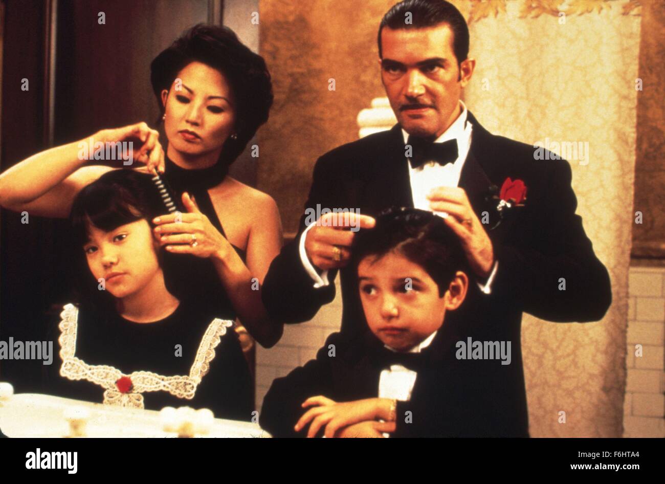 1995, Film Title: FOUR ROOMS, Director: QUENTIN TARANTINO, Studio: MIRAMAX, Pictured: ANTONIO BANDERAS, LANA McKISSACK, QUENTIN TARANTINO, TAMLYN TOMITA. (Credit Image: SNAP) Stock Photo