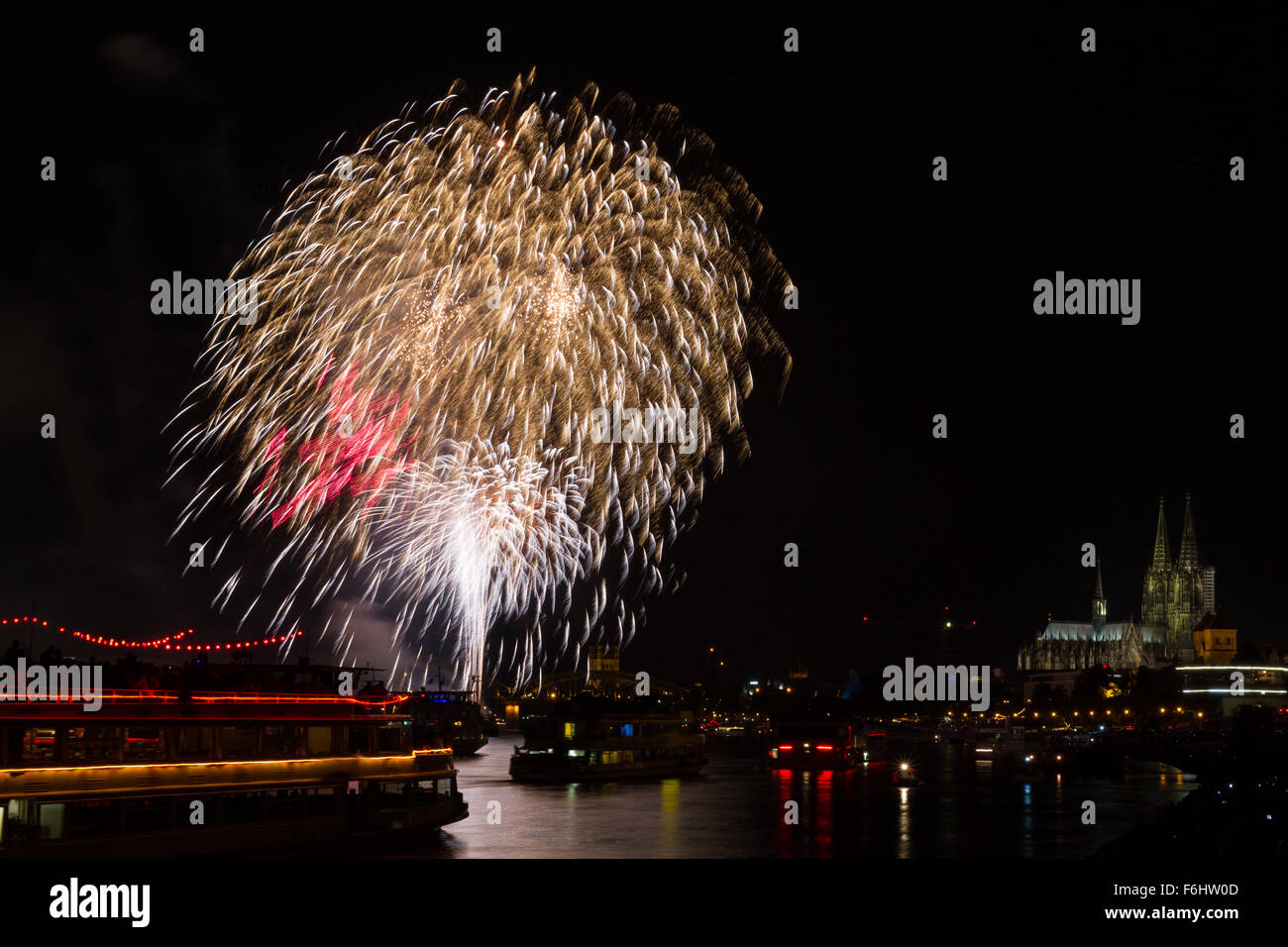 Colourful firework in front of the cathedral of Cologne, Germany Stock Photo