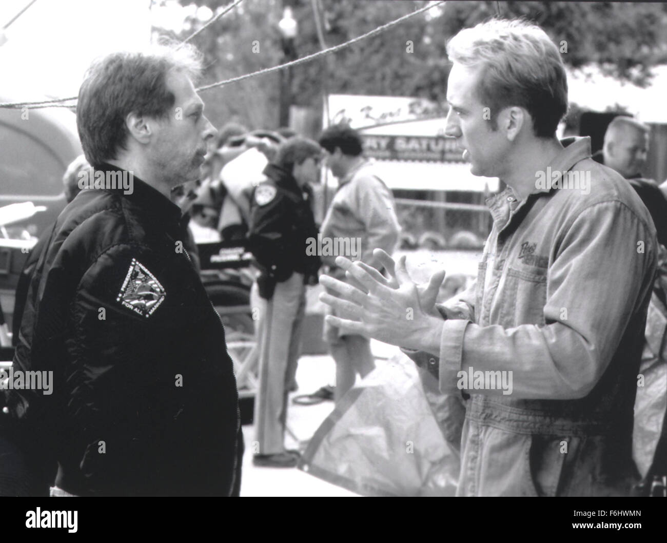 Jul 23, 2002; Hollywood, CA, USA; Producer JERRY BRUCKHEIMER listens to actor NICOLAS CAGES on the set of 'Gone in 60 Seconds.'.  (Credit Image: Auto Images) Stock Photo