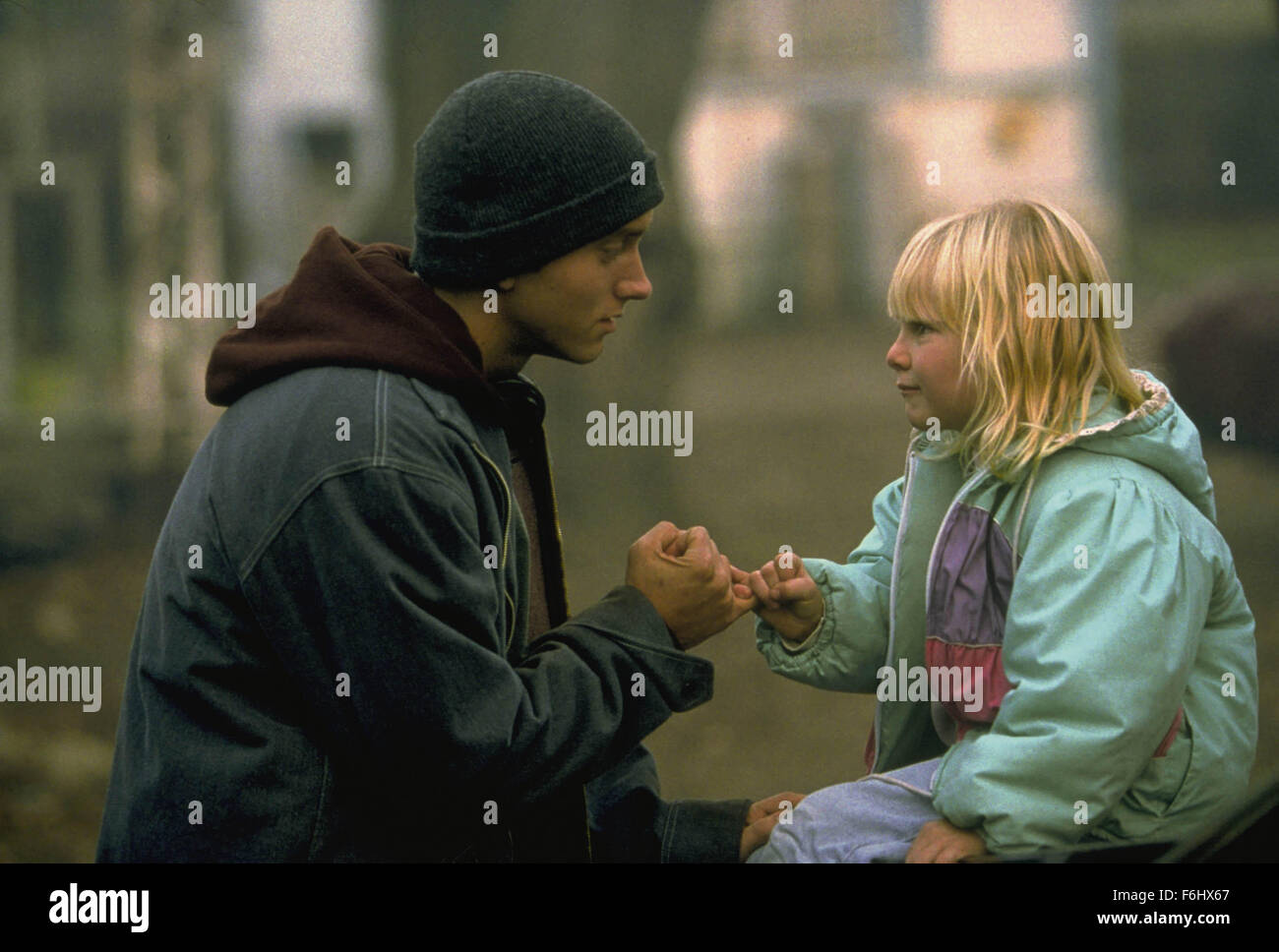 Aug 04, 2002; Hollywood, CA, USA; Actors EMINEM and CHLOE GREENFIELD star as Jimmy Smith Jr. and Stephanie Smith in the musical drama '8 Mile' directed by Curtis Hanson.  A young rapper (Eminem) in Detroit struggles with his anger and social status through music. Stock Photo