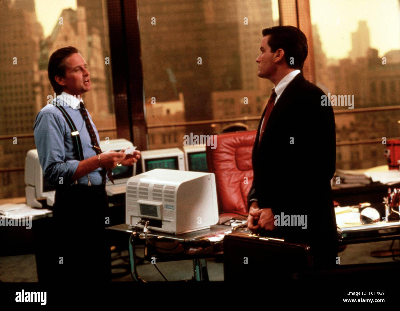 Aug 15, 2002; New York, NY, USA; MICHAEL DOUGLAS and CHARLIE SHEEN in 1987 movie 'Wall Street' directed by Oliver Stone. Stock Photo