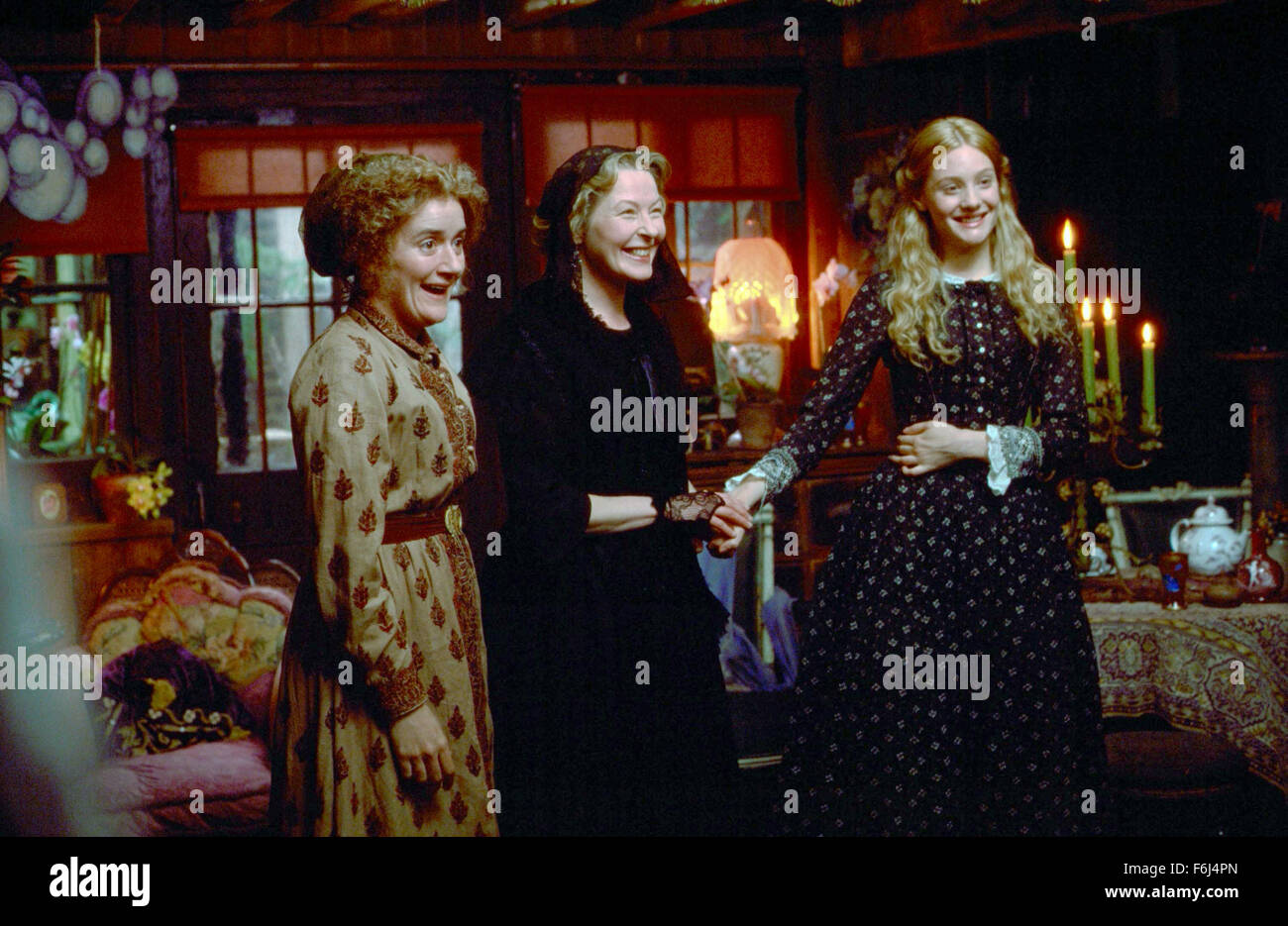 Dec 27, 2002; Hollywood, CA, USA; (left to right) SOPHIE THOMPSON as Miss Lacreevy, STELLA GONET as Mrs. Nickleby, and ROMOLA GARAI as Kate Nickleby in the drama ''Nicholas Nickleby'' directed by Douglas McGrath. Stock Photo