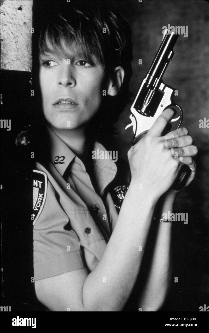 RELEASE DATE: March 16, 1990   MOVIE TITLE: Blue Steel   STUDIO: Lightning Pictures   DIRECTOR: Kathryn Bigelow   PLOT: A female rookie in the police force engages in a cat and mouse game with a pistol wielding psychopath who becomes obsessed with her.   PICTURED: JAMIE LEE CURTIS as Megan Turner.   (Credit Image: c Lightning Pictures/Entertainment Pictures) Stock Photo