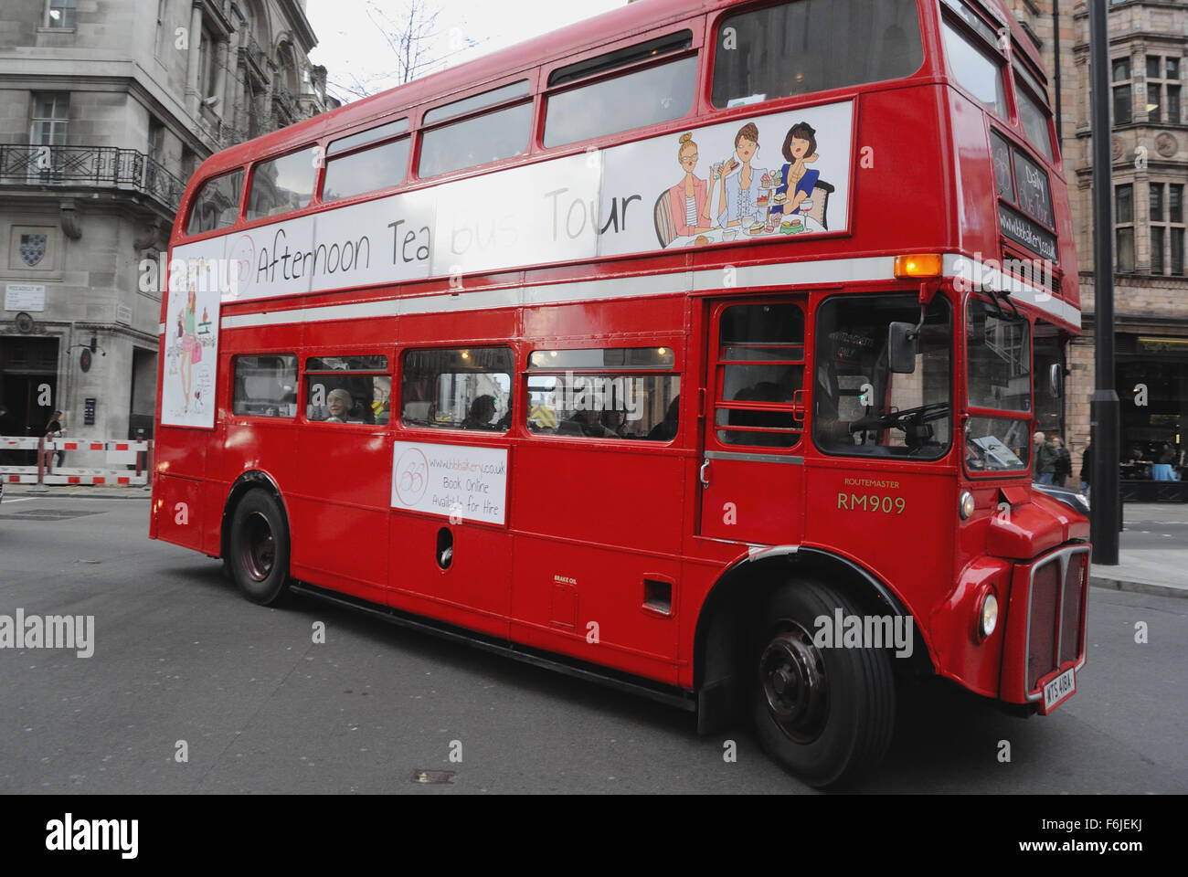 A vintage BB Routemaster double decker bus offering an Afternoon Tea Bus Tour' in Piccadilly, central London England UK Stock Photo