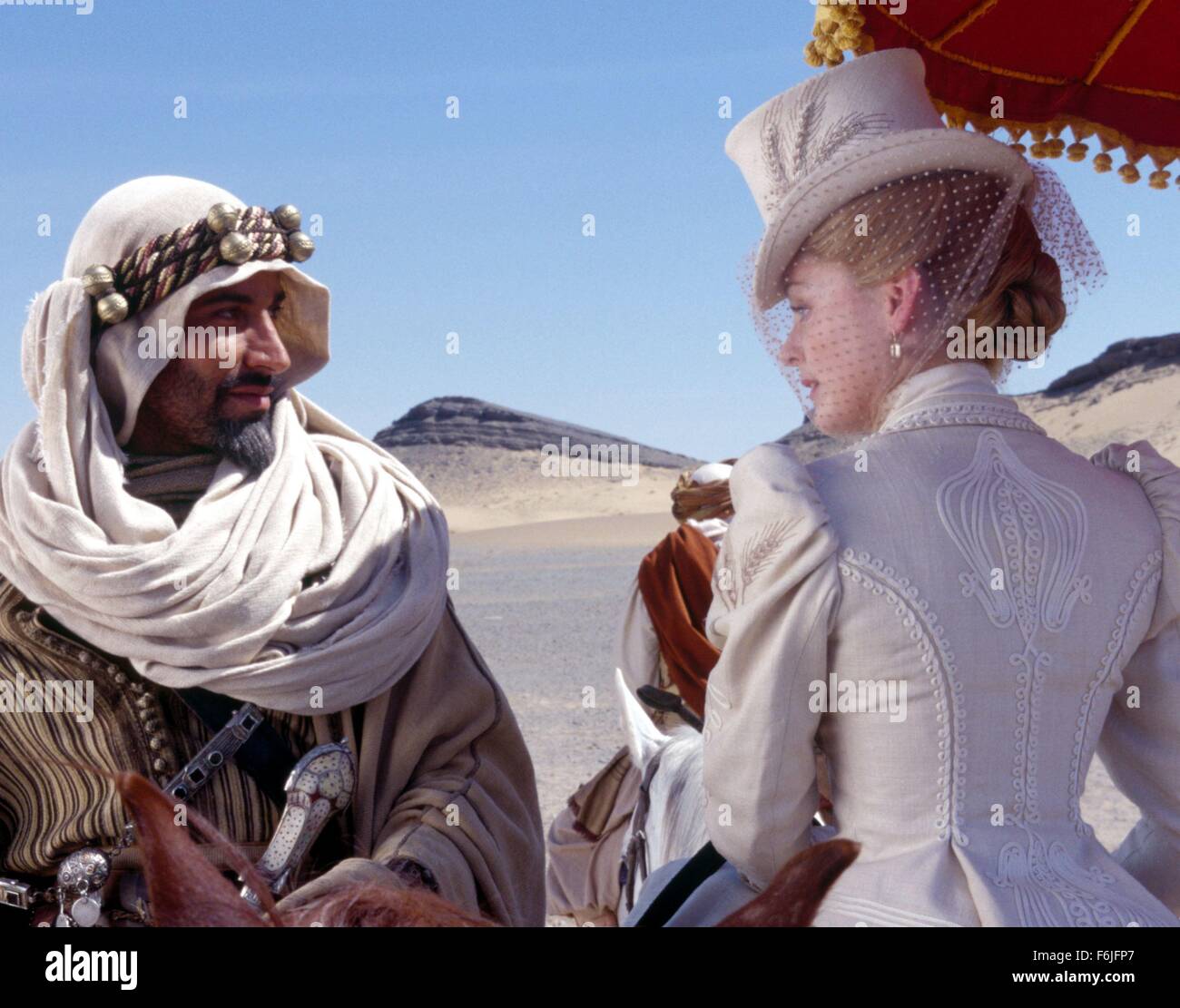 RELEASE DATE: March 5, 2004. MOVIE TITLE: Hidalgo. STUDIO: Touchstone Pictures. PLOT: In 1890, a down-and-out cowboy and his horse travel to Arabia compete in a deadly cross desert horse race. PICTURED: SILAS CARSON as Katib and LOUISE LOMBARD as Lady Anne Davenport. Stock Photo