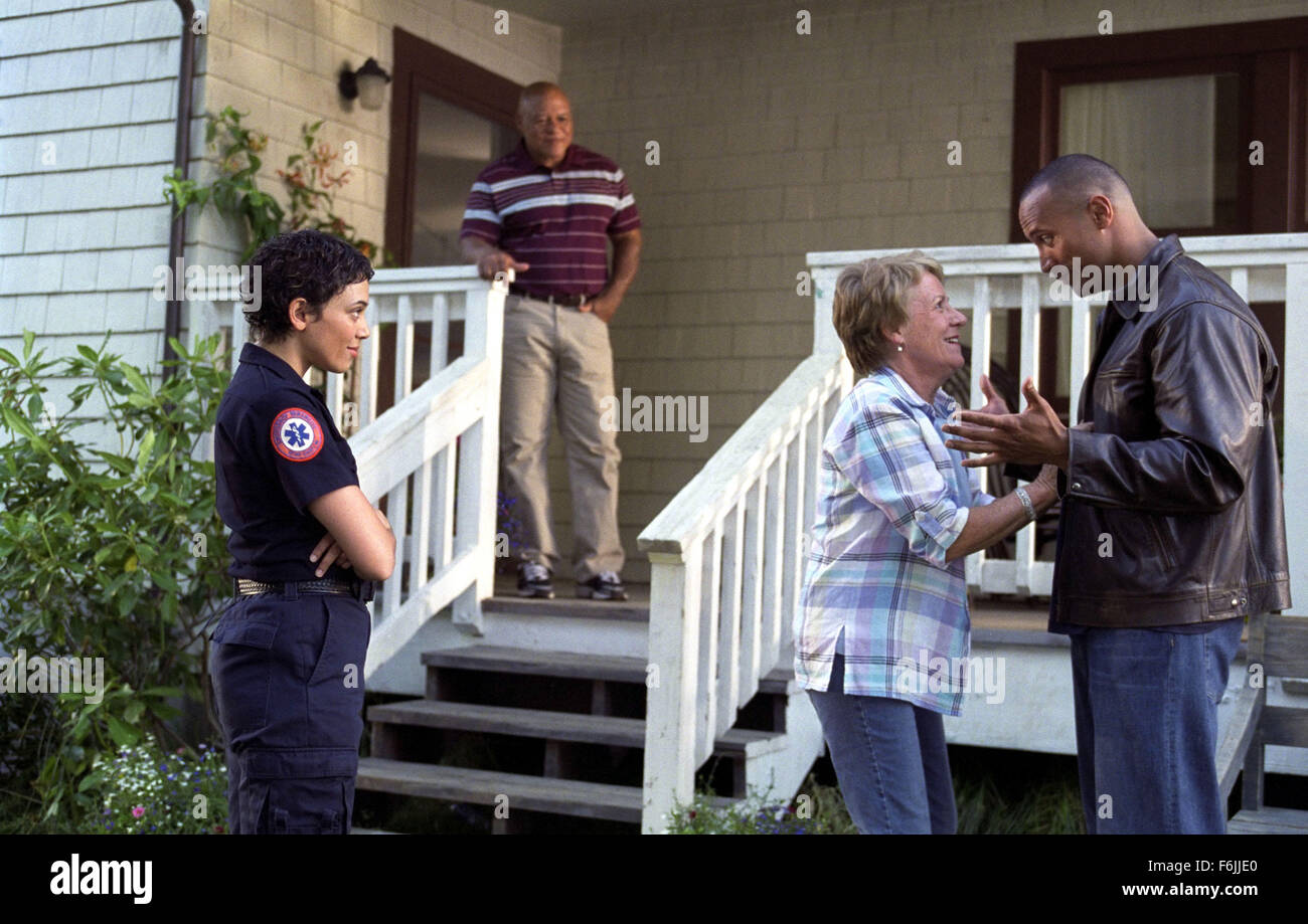 RELEASE DATE: April 2, 2004. MOVIE TITLE: Walking Tall. STUDIO: MGM. PLOT: A former U.S. soldier returns to his hometown to find it overrun by crime and corruption, which prompts him to clean house. PICTURED: KRISTEN WILSON as Michelle, JOHN BEASLEY as Chris, BARBARA TARBUCK as Connie and DWAYNE ''THE ROCK'' JOHNSON as Chris Vaughn. Stock Photo