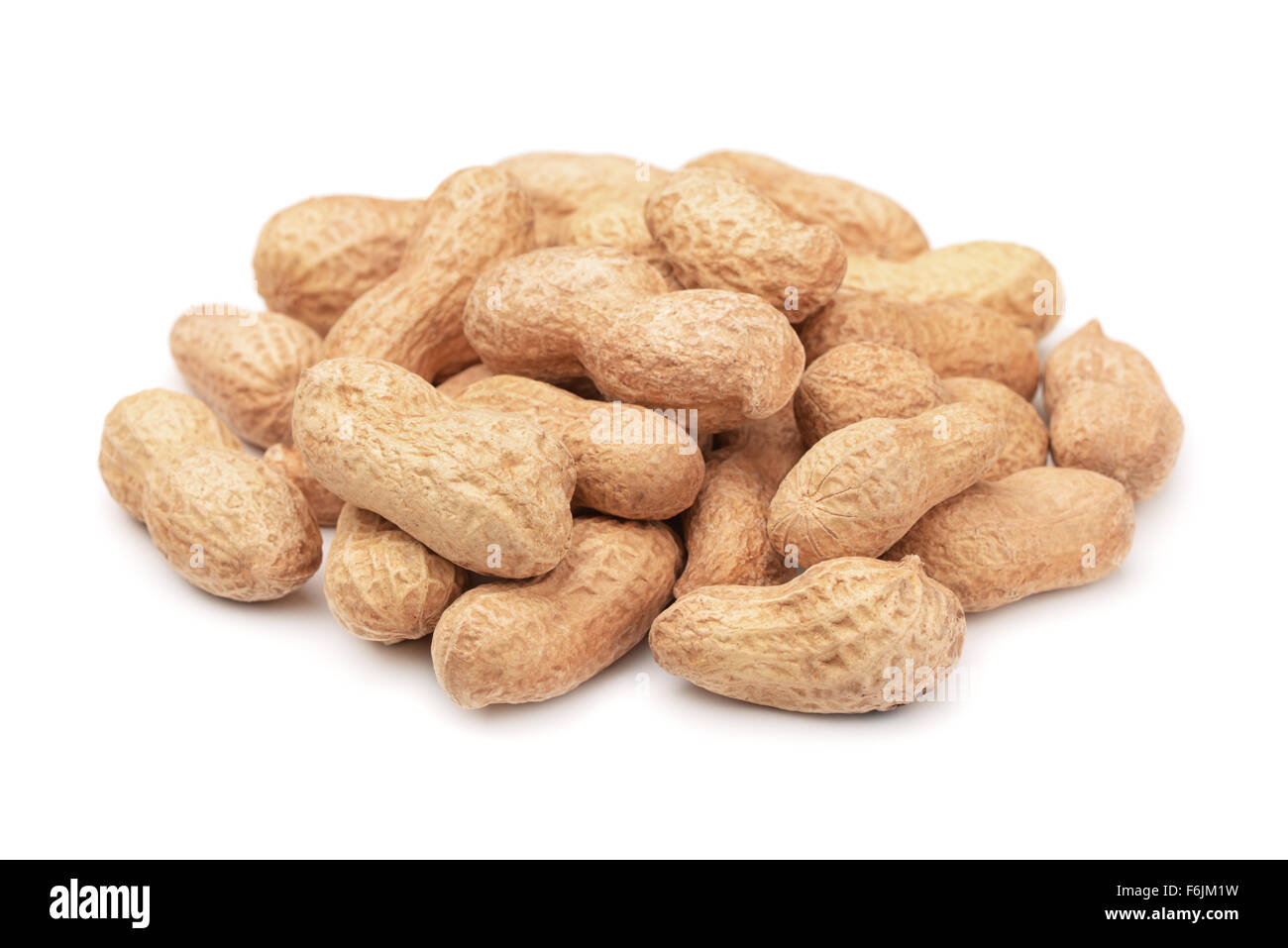 Pile fo shelled peanuts isolated on white Stock Photo