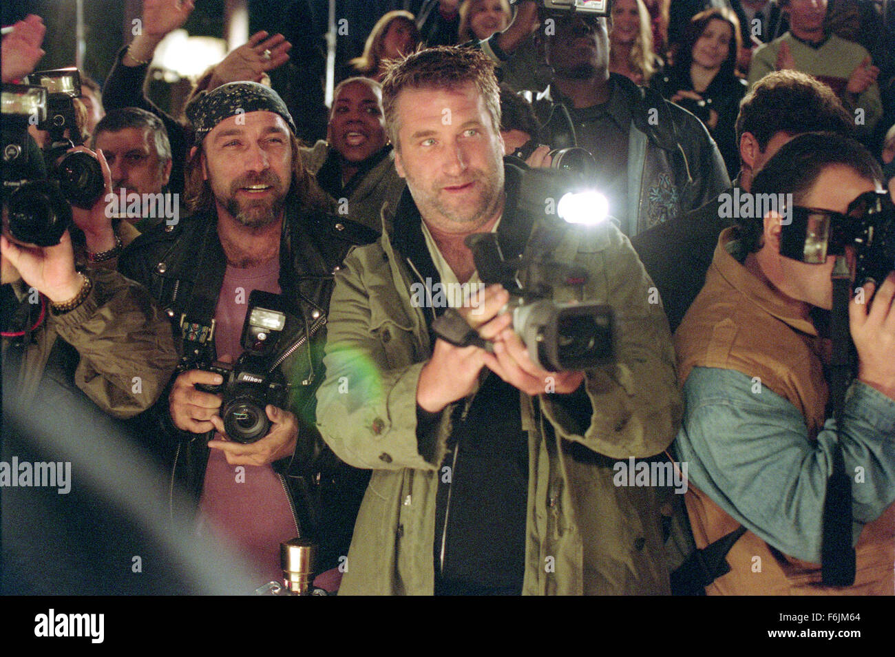 RELEASE DATE: September 3, 2004. MOVIE TITLE: Paparazzi. STUDIO: 20th Century Fox. PLOT: A rising Hollywood actor decides to take personal revenge against a group of four persistent photographers to make them pay for almost causing a personal tragedy involving his wife and son. PICTURED: DANIEL BALDWIN as Paparazzo Wendell Stokes. Stock Photo