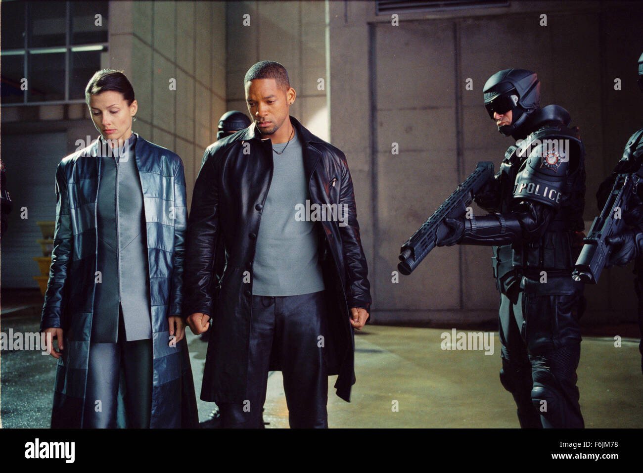 RELEASE DATE: July 16, 2004. MOVIE TITLE: I Robot. STUDIO: 20th Century Fox. PLOT: In the year 2035 a techno-phobic cop investigates a crime that may have been perpetrated by a robot, which leads to a larger threat to humanity. PICTURED: BRIDGET MOYNAHAN as Susan and WILL SMITH as Del Spooner. Stock Photo