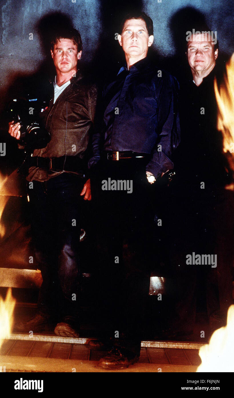 RELEASE DATE: 2001. MOVIE TITLE: Trapped. STUDIO: Playa Inc. PLOT: Oliver Sloan let his family heirloom hotel with casino run down. Among the guests are Anthony Bellio, who plans a take-over, boxing star Clay Laroue Jr and rising TV reporter C. Whitmore Evans, who finishes an item on fire safety. Then a major fire breaks out, which defies owner and fire department's confidence as it consumes rooms and people. PICTURED: MEAT LOAF as Jim Hankins, PARKER STEVENSON as Oliver Sloan and WILLIAM MCNAMARA as C. Whitmore Evans. Stock Photo