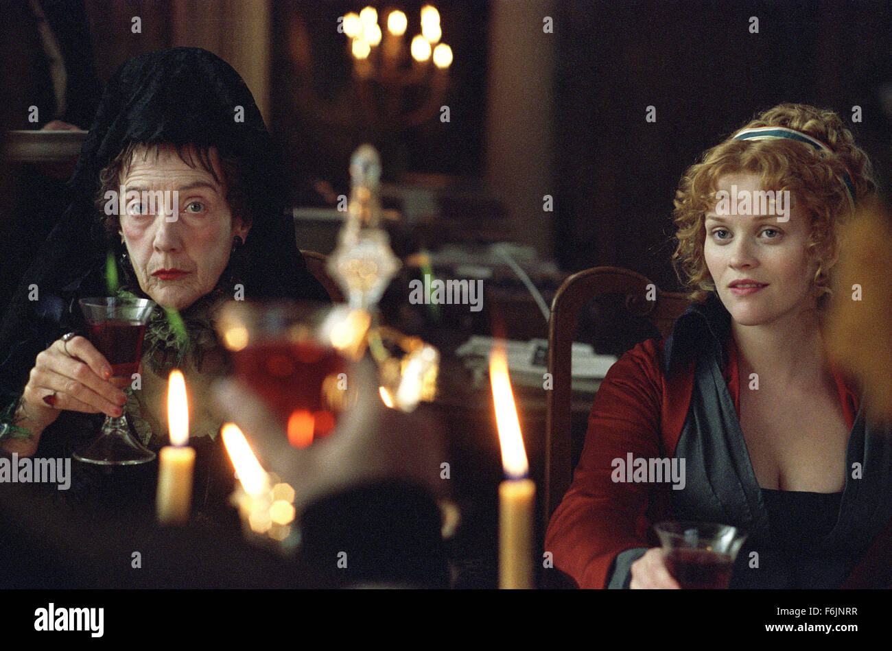 RELEASE DATE: September 1, 2004. MOVIE TITLE: Vanity Fair. STUDIO: Focus Features. PLOT: Growing up poor in London, Becky Sharp (Witherspoon) defies her poverty-stricken background and ascends the social ladder alongside her best friend, Amelia. PICTURED: EILEEN ATKINS and RESSE WITHERSPOON star as Miss Matilda Crawley and Becky Sharp. Stock Photo