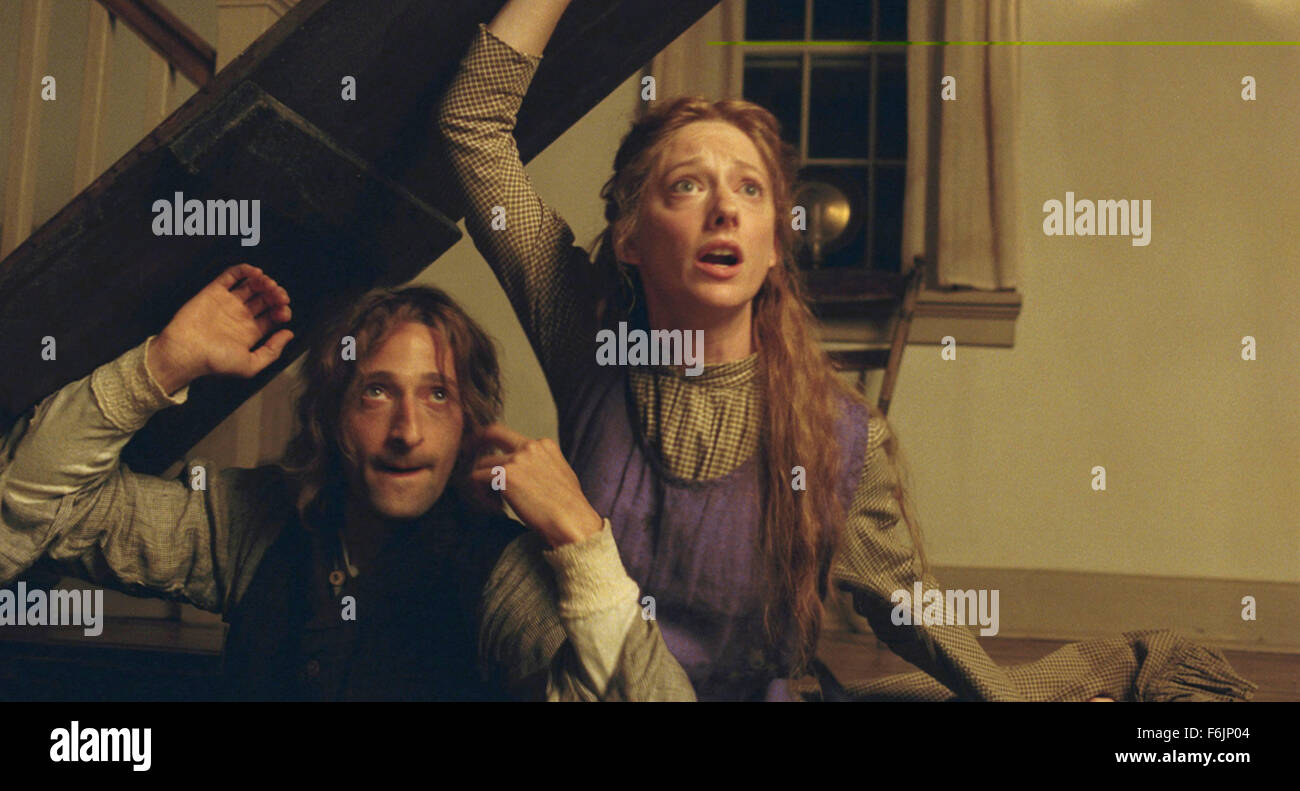 RELEASE DATE: July 30, 2004. MOVIE TITLE: The Village. STUDIO: Touchstone Pictures. PLOT: The population of a small, isolated countryside village believe that their alliance with the mysterious creatures that inhabit the forest around them is coming to an end. PICTURED: ADRIEN BRODY who plays Noah Percy and JUDY GREER as Kitty walker. Stock Photo