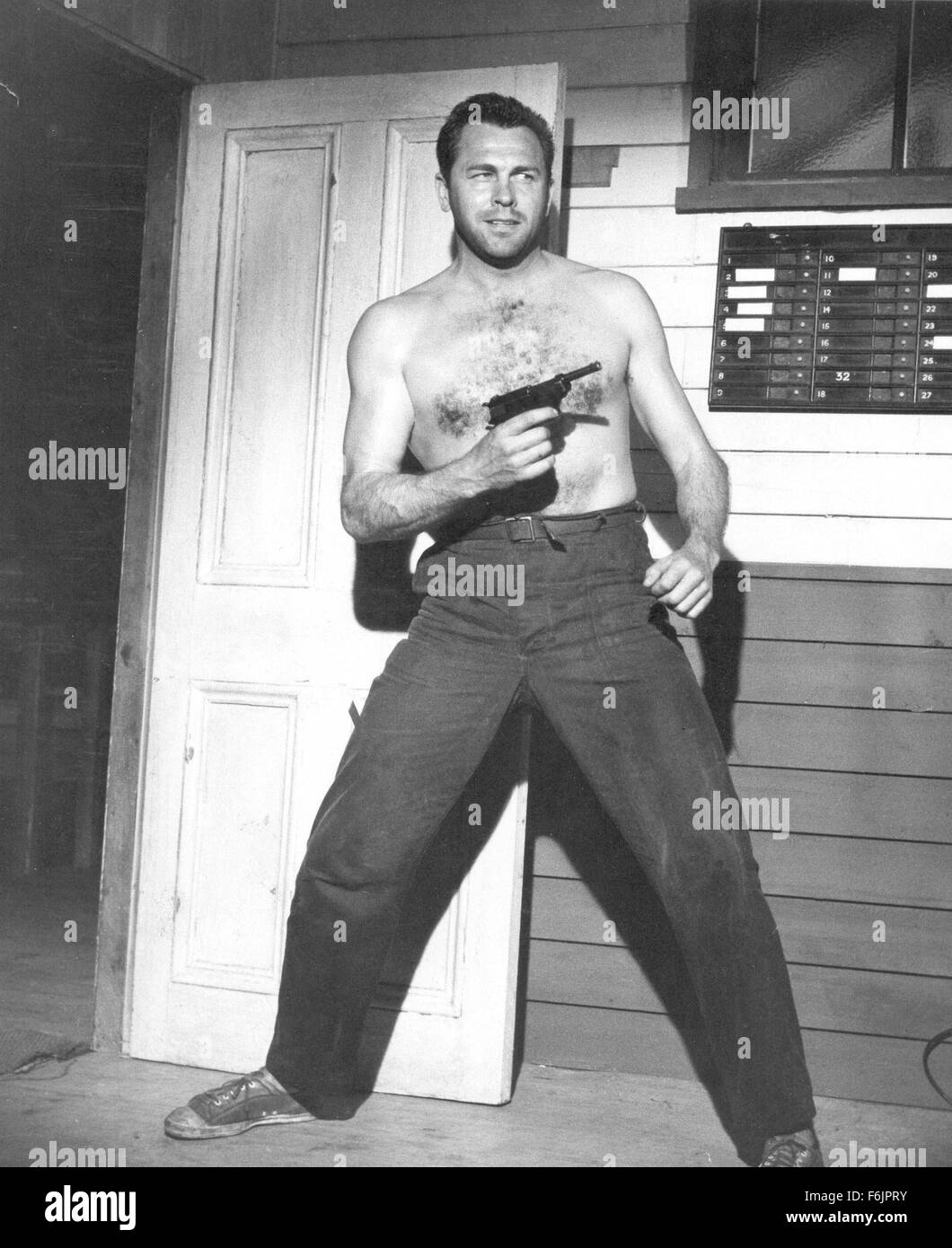 Nov 07, 2004; Los Angeles, CA, USA; File Photo: 1959 MGM Movie Still from 'Flood of Fear.' Singer HOWARD KEEL, the baritone who romanced his way through a series of glittery MGM musicals such as 'Kiss Me Kate' and 'Annie Get Your Gun' and later revived his career with television's 'Dallas,' died Sunday of colon cancer. He was 85. Keel studie shis lines before performance. Stock Photo