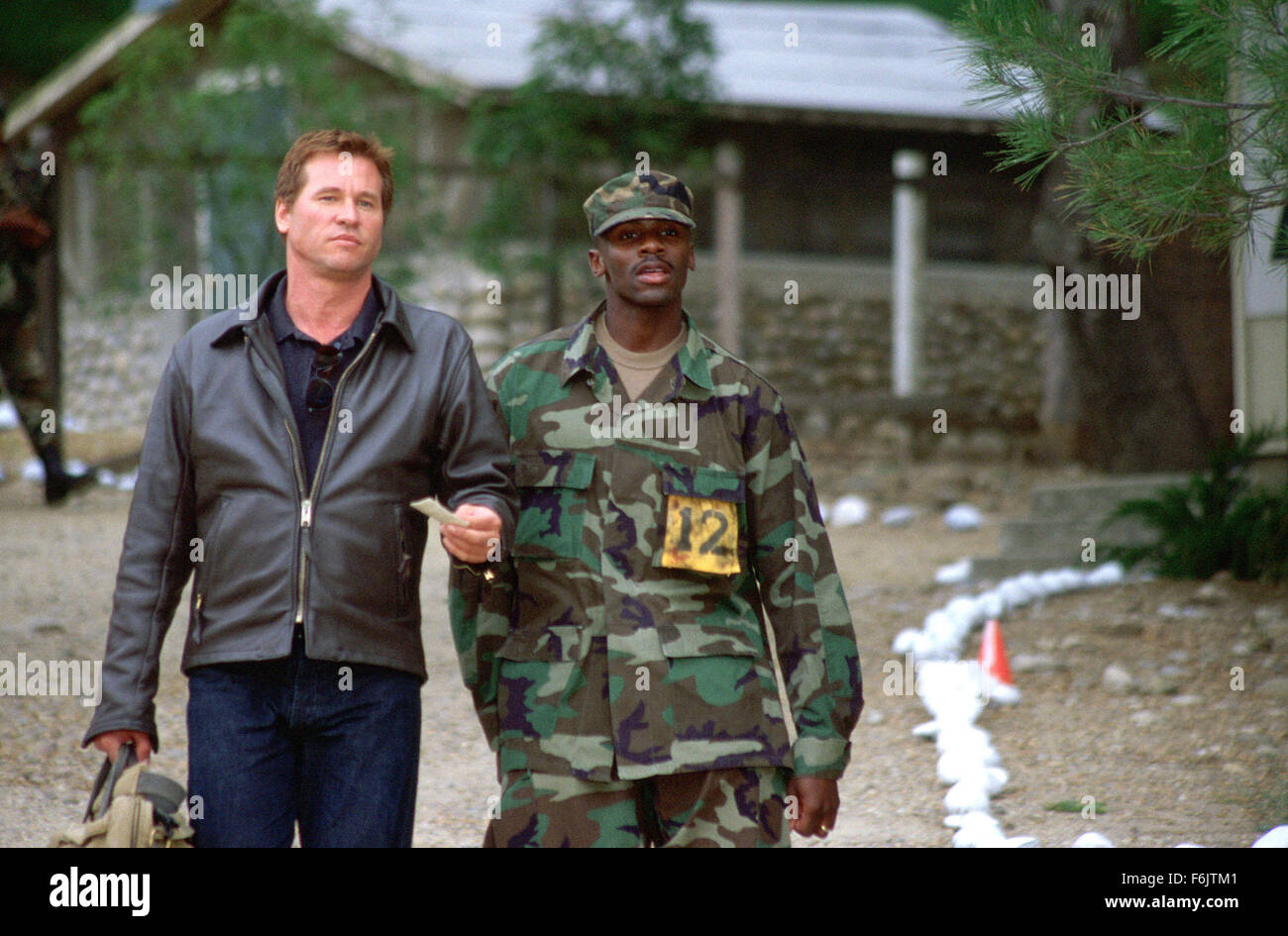 RELEASE DATE: March 12, 2004. MOVIE TITLE: Spartan. STUDIO: ApolloMedia. PLOT: The investigation into a kidnapping of the daughter of a high-ranking US government official. PICTURED: VAL KILMER as Scott and DEREK LUKE as Curtis. Stock Photo