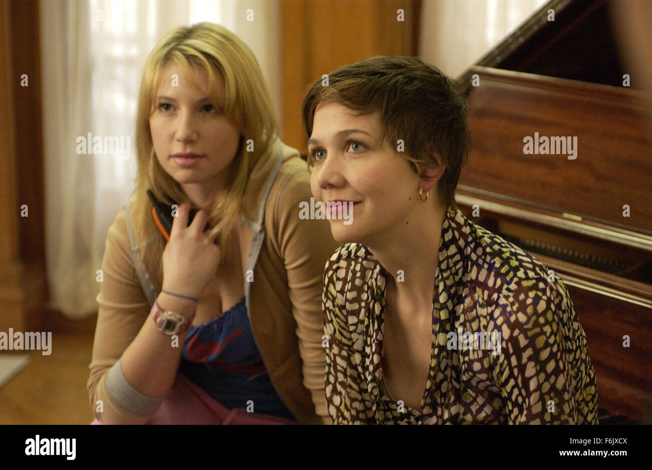 RELEASE DATE: April 22, 2005. MOVIE TITLE: The Great New Wonderful. STUDIO: Serenade Films. PLOT: The Great New Wonderful weaves five stories against the backdrop of an anxious and uncertain post-9-11 New York City. PICTURED: MAGGIE GYLLENHAAL (right) stars as Emme and ARI GRAYNOR as Lisa. Stock Photo