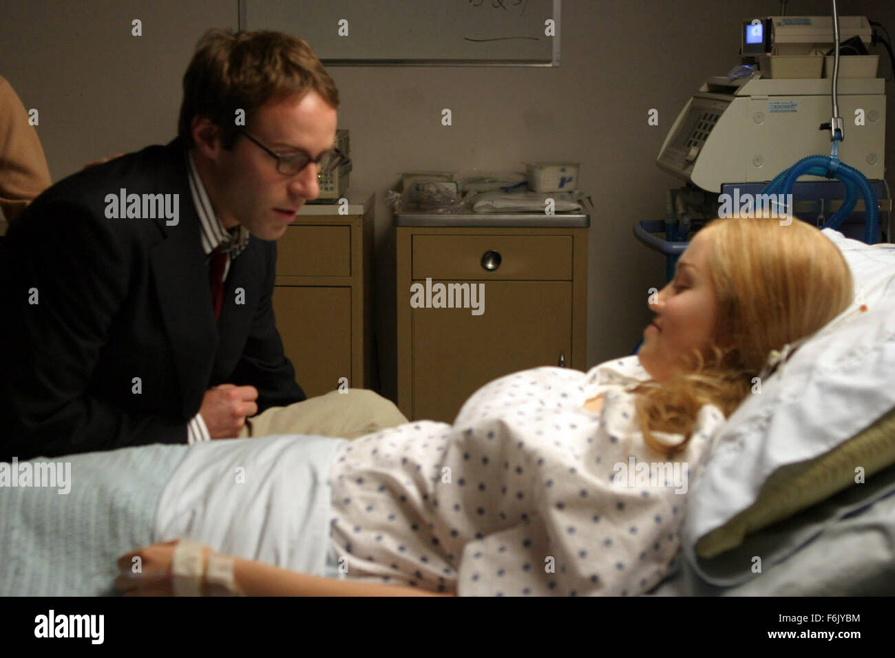 RELEASE DATE: April 23, 2005. MOVIE TITLE: The Sisters. STUDIO: Persistent Entertainment. PLOT: Based on Anton Chekov'sThe Three Sisters about siblings living in a college town who struggle with the death of their father and try to reconcile relationships in their own lives. PICTURED: ALESSANDRO NIVOLA as Andrew Prior and ERIKA CHRISTENSEN as Irene Prior. Stock Photo