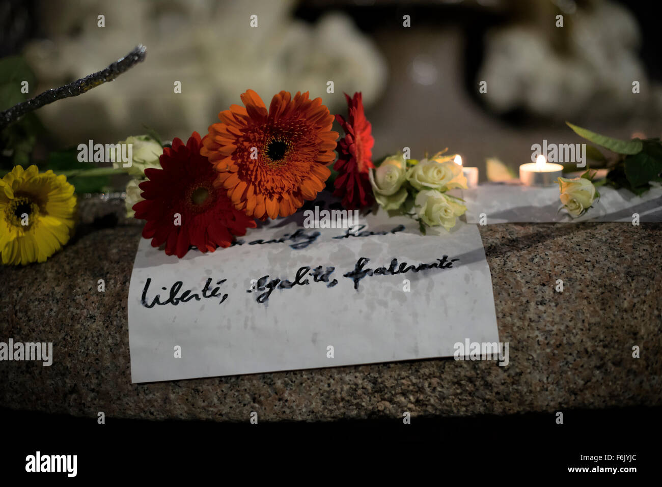 Milan, Italy. November 14, 2015. Memorial of flowers and candles. Reaction to the deadly attacks in Paris of the November 13 Stock Photo