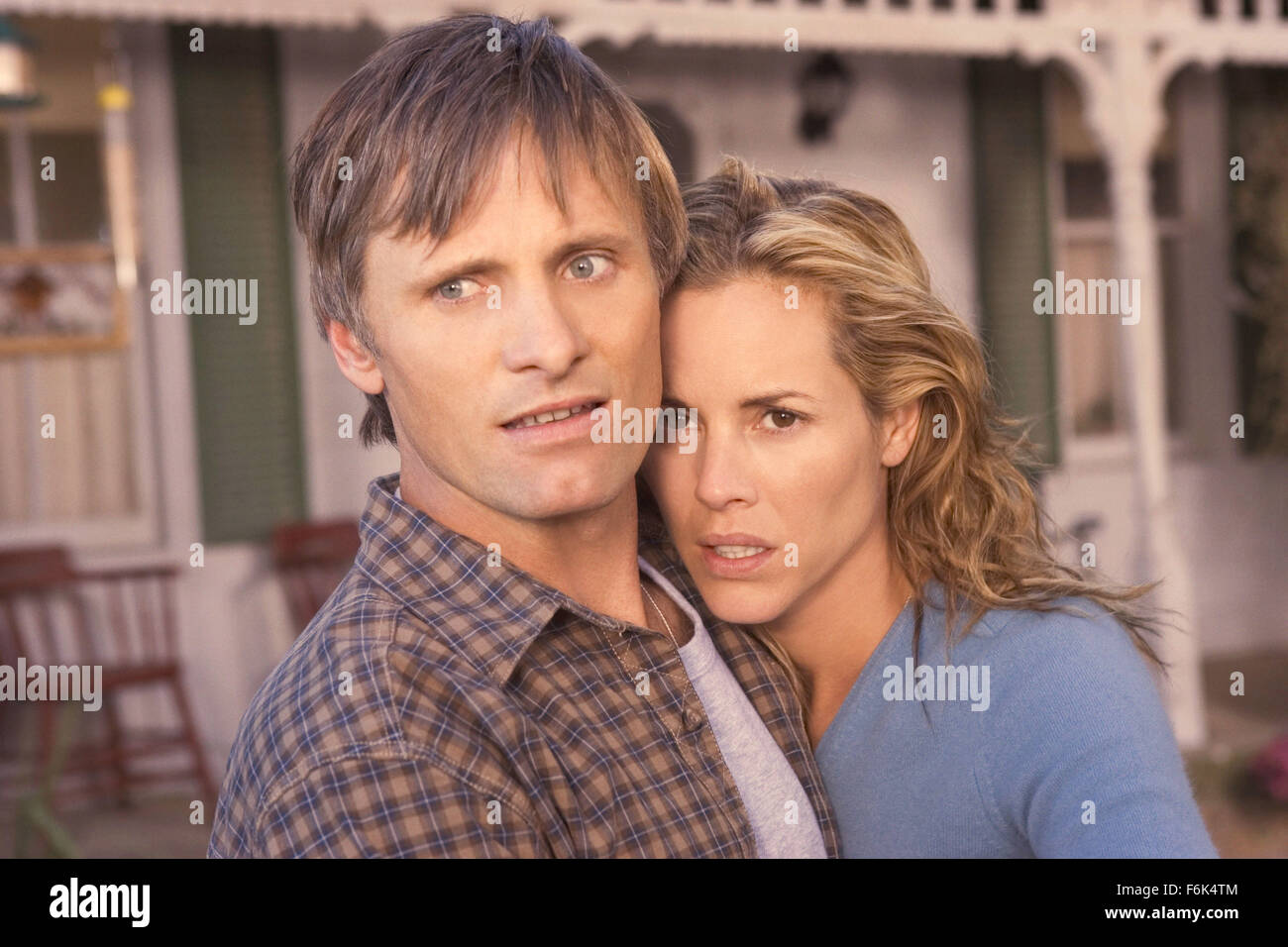 RELEASE DATE: September 30, 2005. MOVIE TITLE: A History of Violence. STUDIO: New Line Cinema. PLOT: A mild-mannered man becomes a local hero through an act of violence, which sets off repercussions that will shake his family to its very core. PICTURED: Actor VIGGO MORTENSEN stars as Tom Stall and MARIA BELLO as Edie Stall. Stock Photo