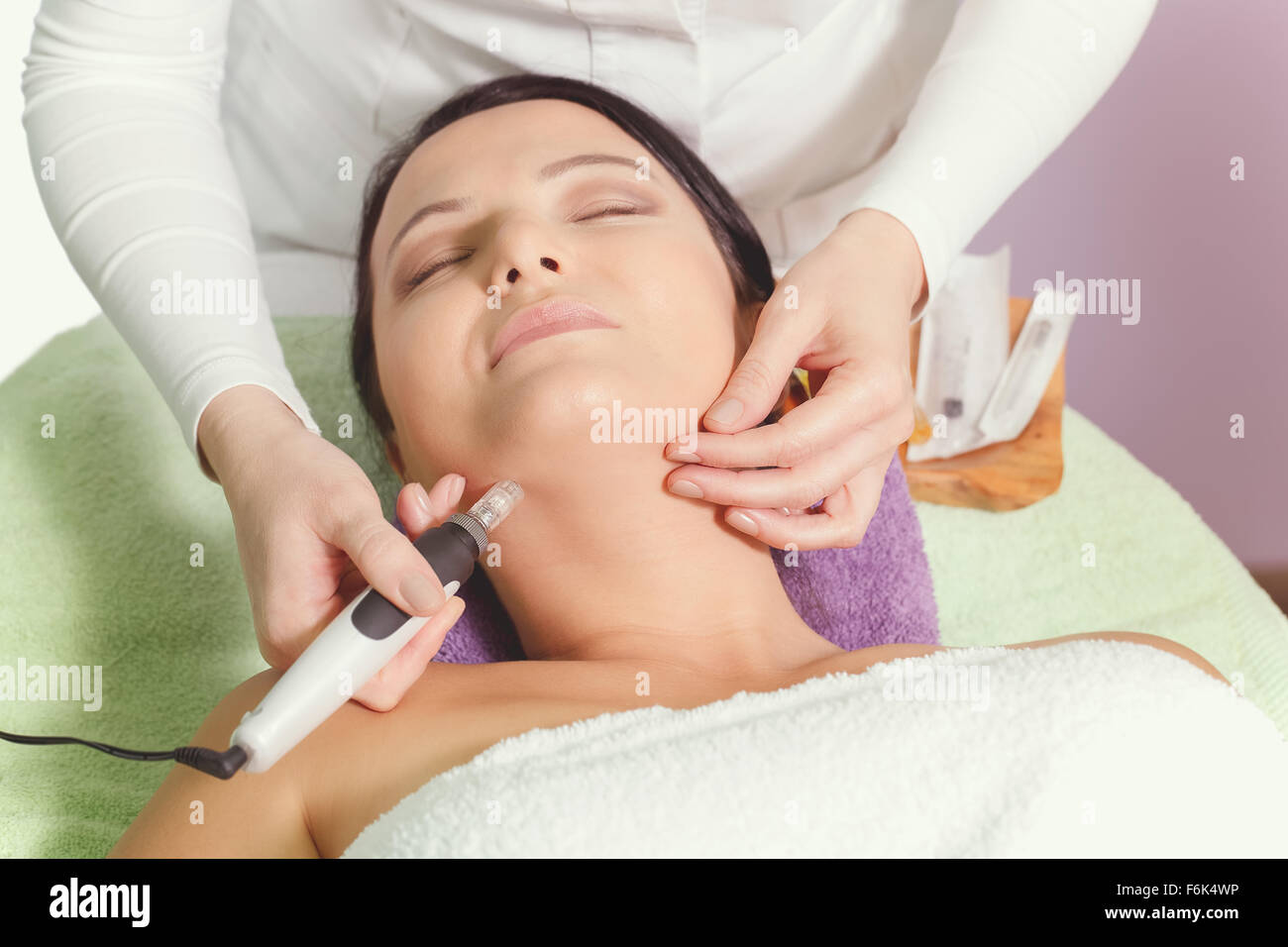 Mesotherapy, anti ageing treatment. Woman having mesotherapy facial treatment at beauty salon Stock Photo