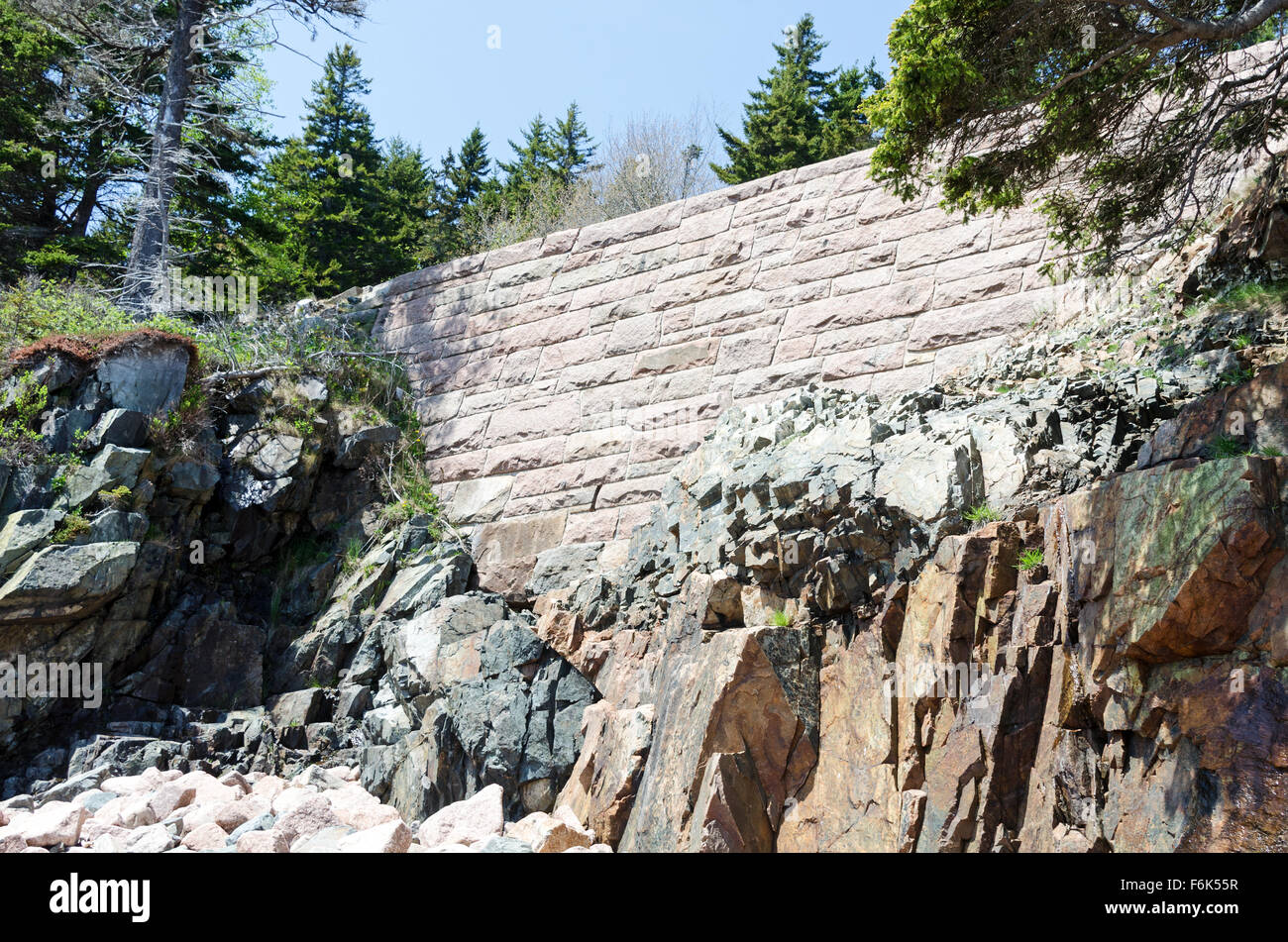 Looking up at historic stonework supporting the Park Loop Road in Acadia National Park, Maine. Stock Photo