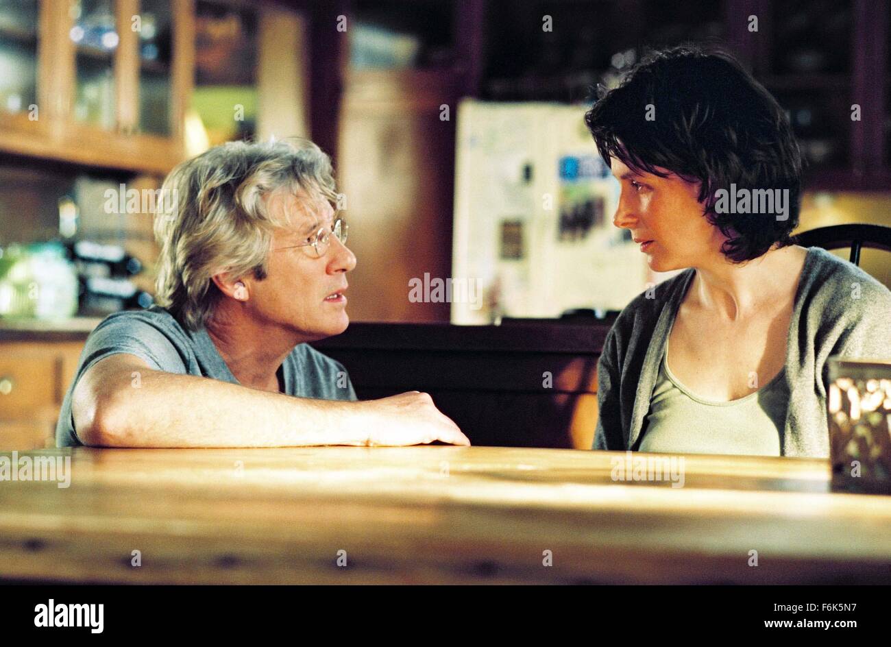 RELEASE DATE: September 3, 2005. MOVIE TITLE: Bee Season. STUDIO: Fox Searchlight. PLOT: A wife and mother begins a downward emotional spiral, as her husband avoids their collapsing marriage by immersing himself in his 11 year-old daughter's quest to become a spelling bee champion. PICTURED: RICHARD GERE as Saul Naumann and JULIETTE BINOCHE as Miriam Neumann. Stock Photo