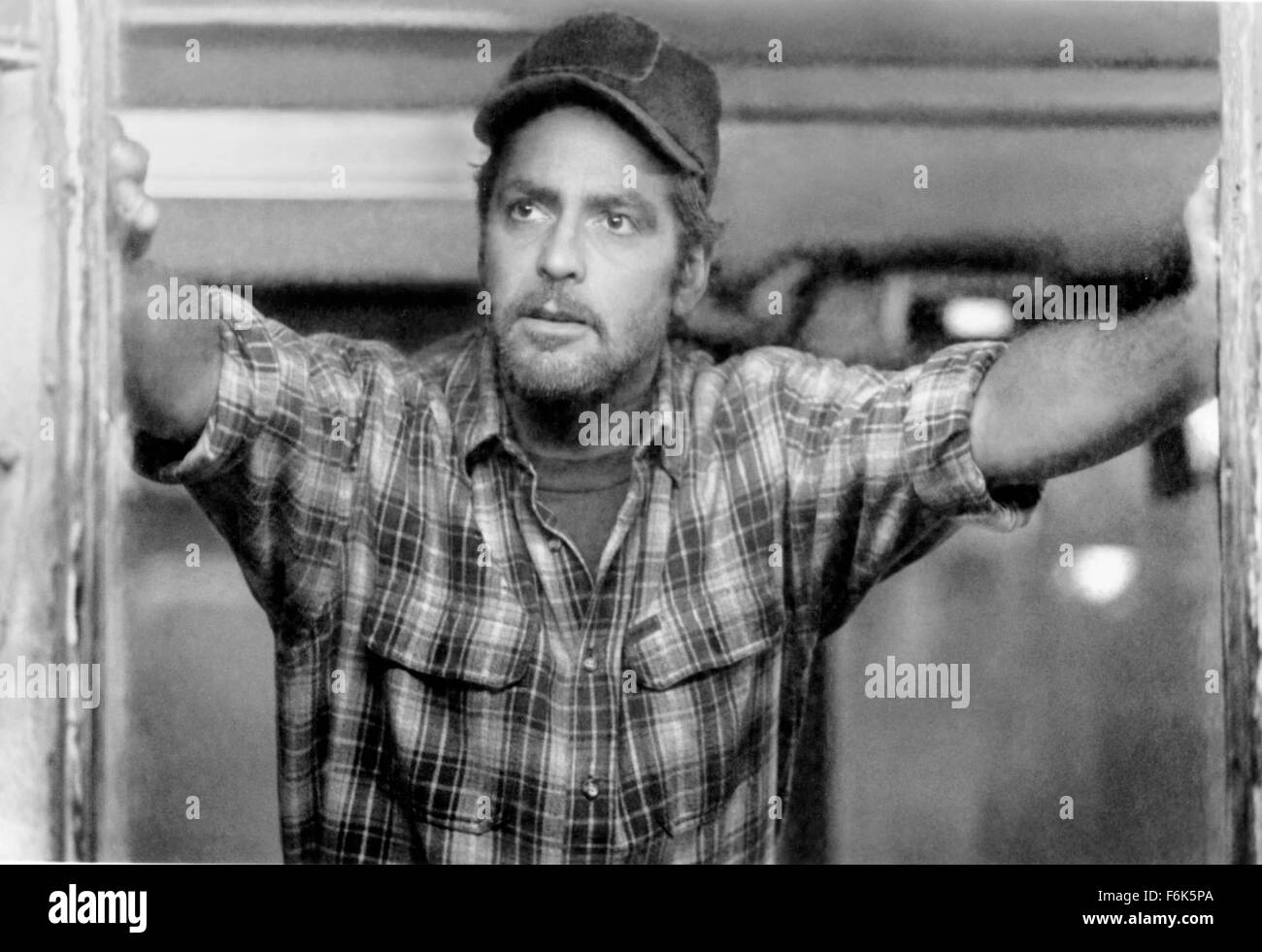 RELEASE DATE: June 30, 2000. MOVIE TITLE: The Perfect Storm. STUDIO: Warner Brothers Pictures. PLOT: An unusually intense storm pattern catches some commercial fishermen unaware and puts them in mortal danger. PICTURED: GEORGE CLOONEY as Captain Billy Tyne. Stock Photo