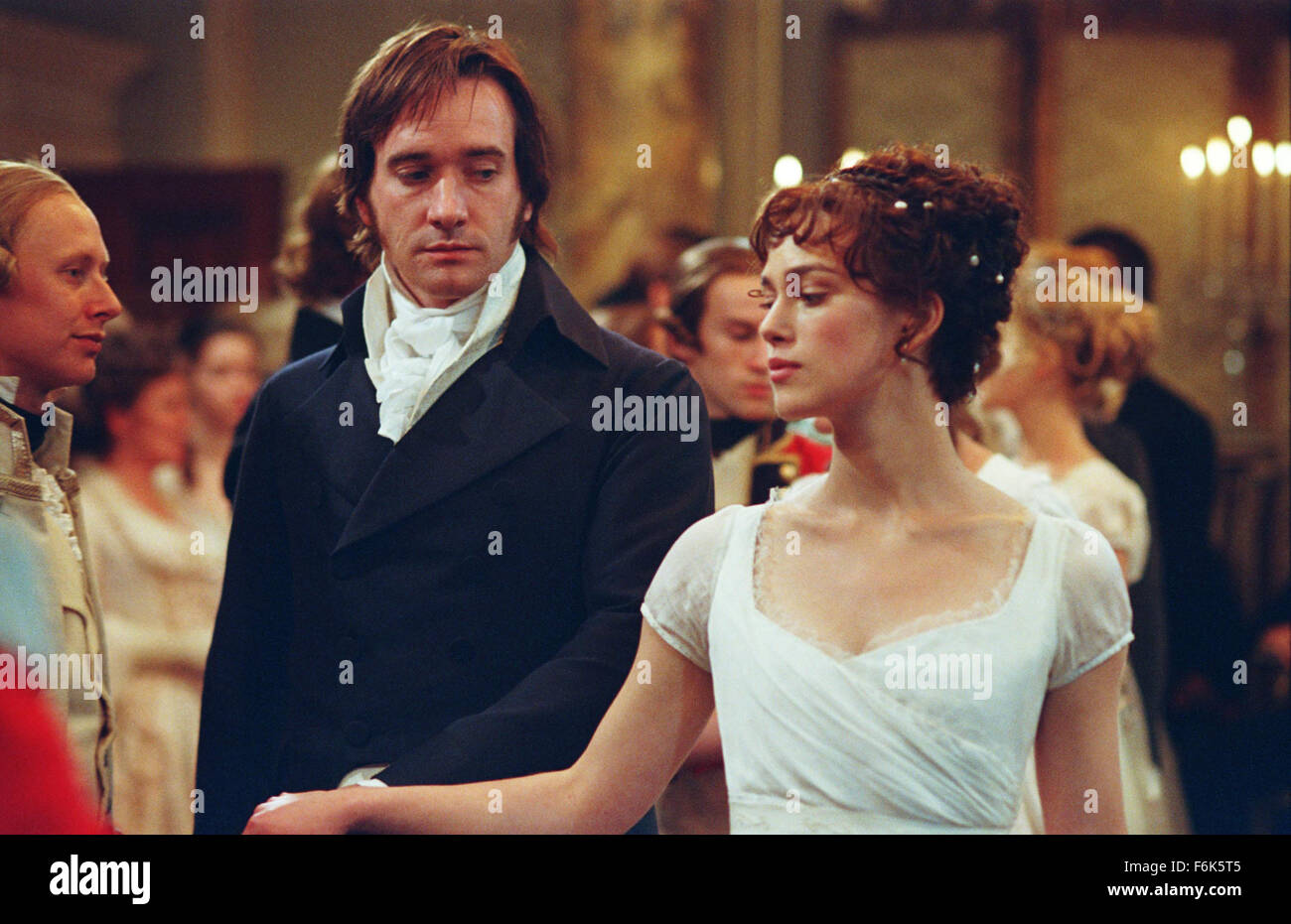 RELEASE DATE: November 23, 2005. MOVIE TITLE: Pride and Prejudice. STUDIO: Focus Features. PLOT: The story is based on Jane Austen's novel about five sisters - Jane, Elizabeth, Mary, Kitty and Lydia Bennet - in Georgian England. Their lives are turned upside down when a wealthy young man (Mr. Bingley) and his best friend (Mr. Darcy) arrive in their neighborhood. PICTURED: MATTHEW MACFADYEN (left) as Mr. Darcy and KEIRA KNIGHTLEY (right) as Elizabeth Bennet. Stock Photo