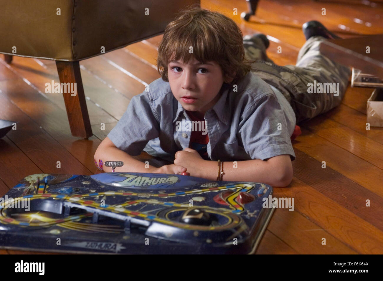 RELEASE DATE: November 11, 2005. MOVIE TITLE: Zathura: A Space Adventure. STUDIO: Columbia Pictures. PLOT: Two young brothers are drawn into an intergalactic adventure when their house is magically hurtled through space because of the board game they are playing. PICTURED: JONAH BOBO stars as Danny Budwing. Stock Photo