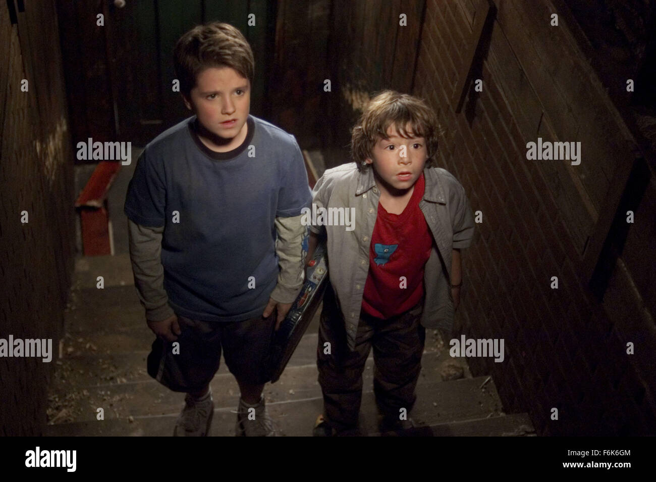 RELEASE DATE: November 11, 2005. MOVIE TITLE: Zathura: A Space Adventure. STUDIO: Columbia Pictures. PLOT: Two young brothers are drawn into an intergalactic adventure when their house is magically hurtled through space because of the board game they are playing. PICTURED: JOSH HUTCHERSON as Walter Budwing and JONAH BOBO as Danny Budwing. Stock Photo