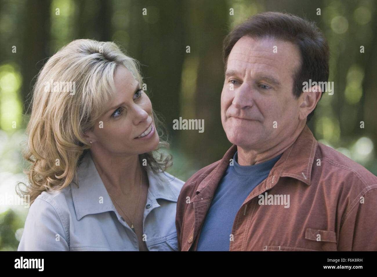 RELEASE DATE: April 28, 2006. MOVIE TITLE: RV. STUDIO: Columbia Pictures. PLOT: Bob Munro and his dysfunctional family rent an RV for a road trip to the Colorado Rockies, where they ultimately have to contend with a bizarre community of campers. PICTURED: ROBIN WILLIAMS as Bob Munro and CHERYL HINES as Jamie Munro. Stock Photo