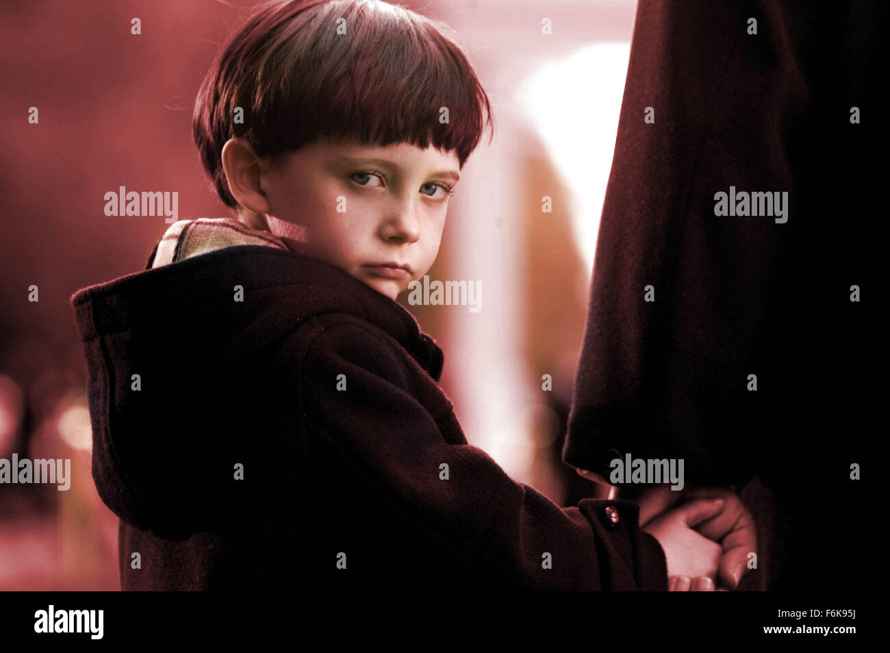 RELEASE DATE: June 6, 2006. MOVIE TITLE: The Omen. STUDIO: 20th Century Fox. PLOT: A remake of the 1976 horror classic The Omen (1976), an American official realizes that his young son may literally be the devil incarnate. PICTURED: SEAMUS DAVEY-FITZPATRICK as Damien. Stock Photo