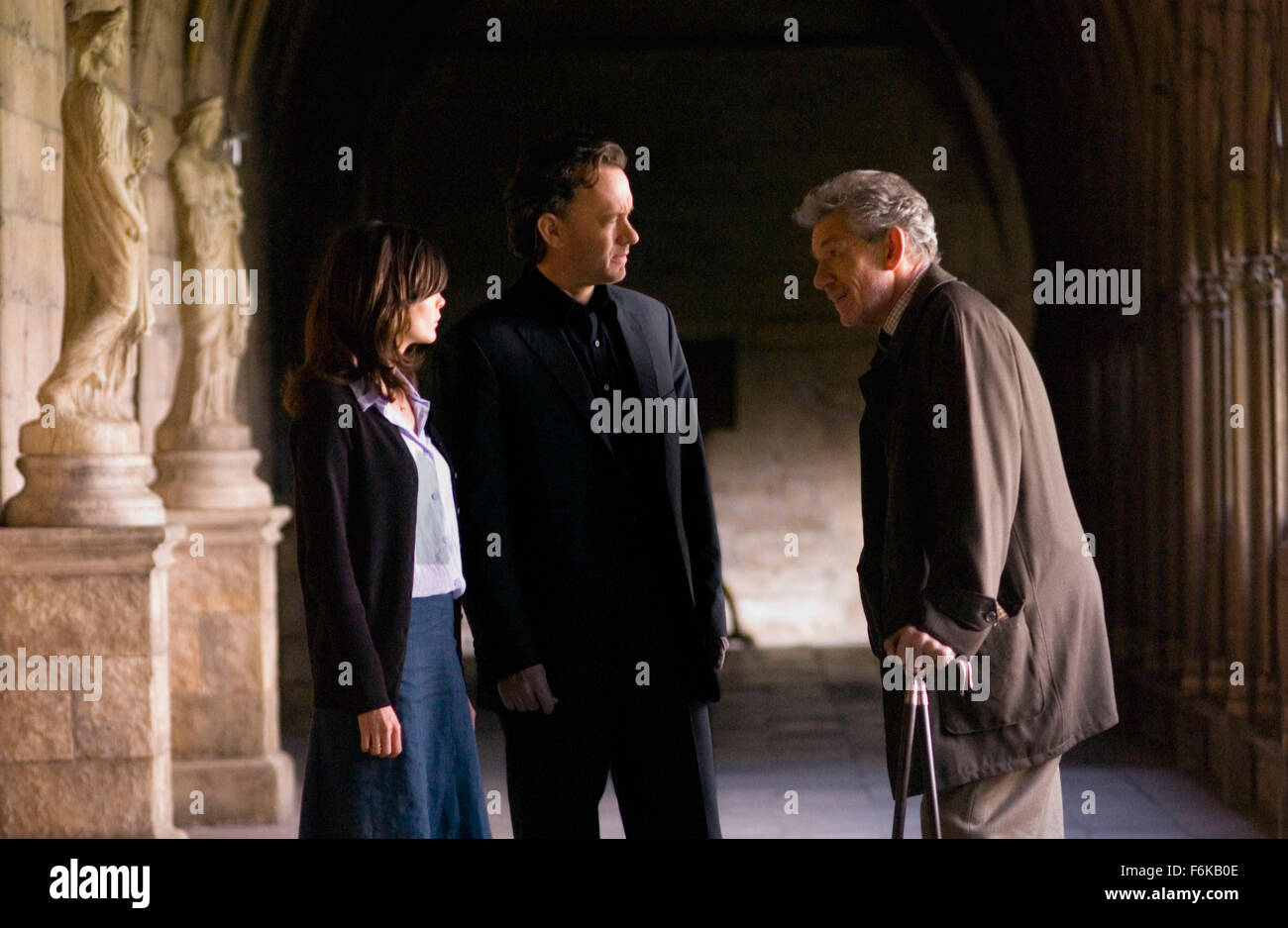 May 19, 2006; Paris, FRANCE; Actor TOM HANKS (center) stars as Robert Langdon, AUDREY TAUTOU as Sophie Neveu and IAN MCKELLEN as Sir Leigh Teabing in the Ron Howard directed adaptation of Dan Brown's, 'The Da Vinci Code.' Mandatory Credit: Photo by Columbia Pictures. (c) Copyright 2006 by Courtesy of Columbia Pictures Stock Photo