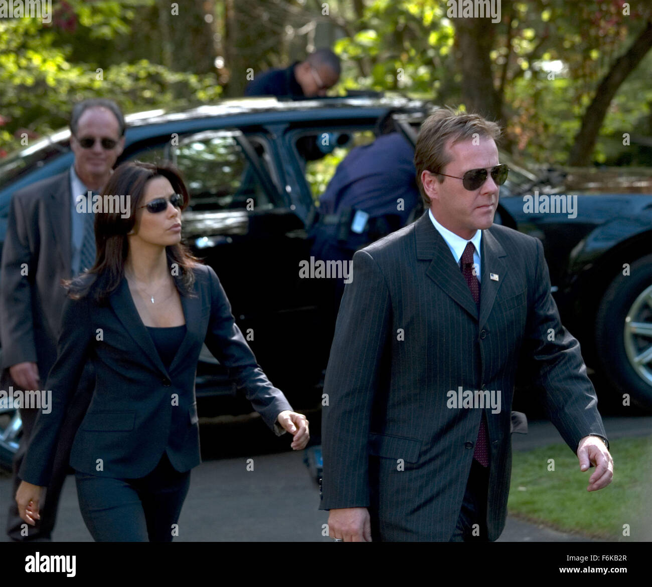 RELEASE DATE: April 21, 2006. MOVIE TITLE: The Sentinel. STUDIO: 20th Century Fox. PLOT: A secret service agent is framed as the mole in an assassination attempt on the president. He must clear his name and foil another assassination attempt while on the run from a relentless FBI agent. PICTURED: EVA LONGORIA stars as Jill Marin and KIEFER SUTHERLAND as David Breckinridge. Stock Photo