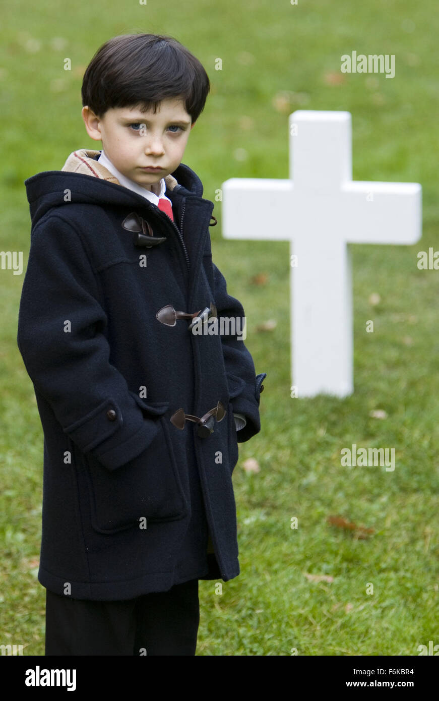 RELEASE DATE: June 6, 2006. MOVIE TITLE: The Omen. STUDIO: 20th Century Fox. PLOT: A remake of the 1976 horror classic The Omen (1976), an American official realizes that his young son may literally be the devil incarnate. PICTURED: SEAMUS DAVEY-FITZPATRICK stars as Damien. Stock Photo