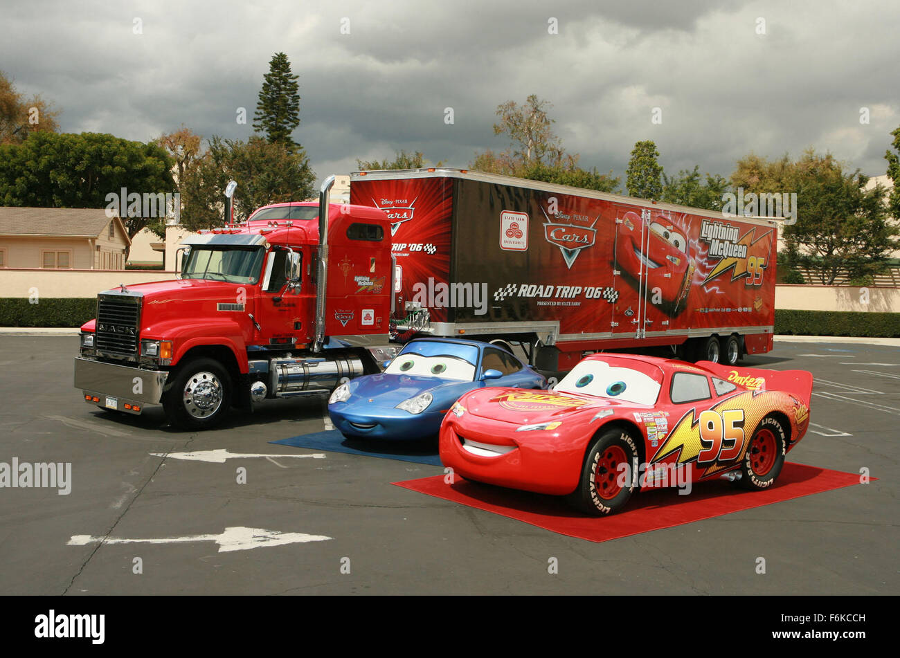 RELEASE DATE: March 14, 2006. MOVIE TITLE: Cars. STUDIO: Walt Disney Pictures, Pixar Animation Studios. PLOT: While traveling to California for the dispute of the final race of the Piston Cup against The King and Chick Hicks, the famous Lightning McQueen accidentally damages the road of the small town Radiator Springs and is sentenced to repair it. Lightning McQueen has to work hard and finds friendship and love in the simple locals, changing its values during his stay in the small town and becoming a true winner. PICTURED: . Stock Photo