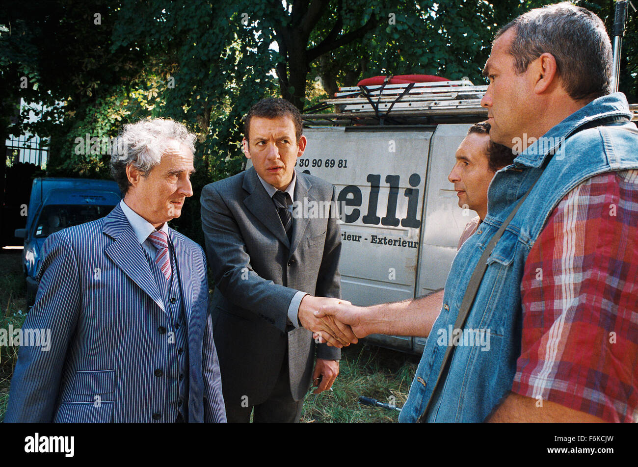RELEASE DATE: June 07, 2006. MOVIE TITLE: La Maison Du Bonheur. STUDIO: Pathe Renn Productions. PLOT: On a mission to loosen up, a miser's sets about buying a house in the country for his family. PICTURED: DANIEL PREVOST as Jean-Pierre Draquart and DANY BOON as Charles Boulin. Stock Photo