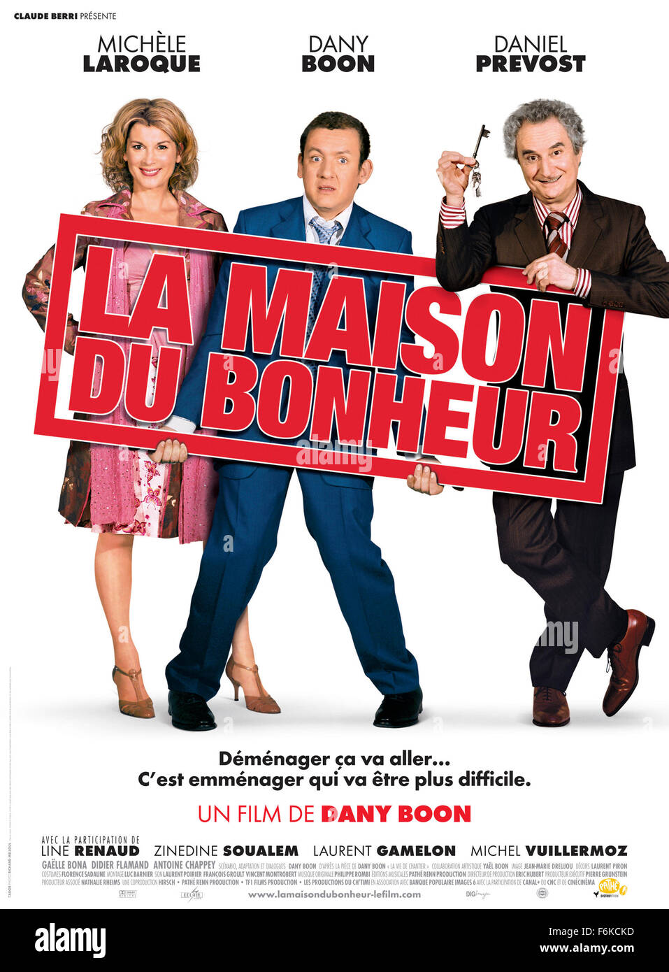 RELEASE DATE: June 07, 2006. MOVIE TITLE: La Maison Du Bonheur. STUDIO: Pathe Renn Productions. PLOT: On a mission to loosen up, a miser's sets about buying a house in the country for his family. PICTURED: MICHELE LAROQUE as Anne Boulin, DANY BOON as Charles Boulin, DANIEL PREVOST as Jean-Pierre Draquart, Movie Poster. Stock Photo
