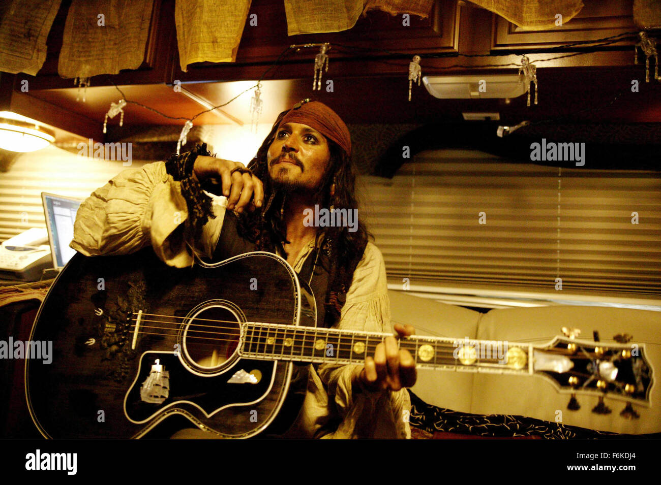 RELEASE DATE: July 7, 2006. MOVIE TITLE: Pirates of the Caribbean: Dead Man's Chest. STUDIO: Walt Disney Pictures. PLOT: Jack Sparrow races to recover the heart of Davy Jones to avoid enslaving his soul to Jones' service, as other friends and foes seek the heart for their own agenda as well. PICTURED: JOHNNY DEPP as Captain Jack Sparrow. Stock Photo