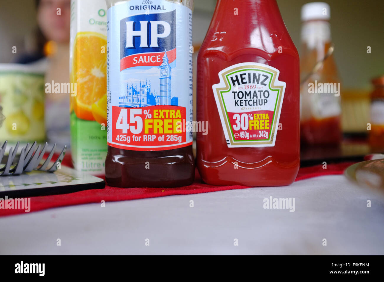 A HP sauce bottle next to a tomato sauce bottle on a breakfast table Stock  Photo - Alamy