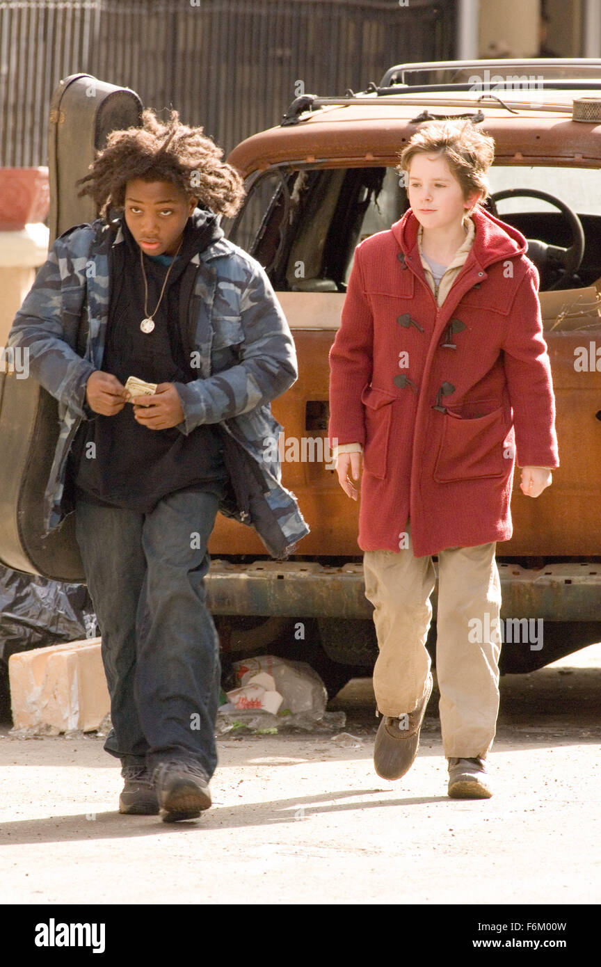 RELEASE DATE: Oct 21, 2007. MOVIE TITLE: August Rush. STUDIO: CJ Entertainment. PLOT: The story of a charismatic young Irish guitarist and a sheltered young cellist who have a chance encounter one magical night above New York's Washington Square, but are soon torn apart, leaving in their wake an infant, August Rush, orphaned by circumstance. Now performing on the streets of New York and cared for by a mysterious stranger, August uses his remarkable musical talent to seek the parents from whom he was separated at birth. PICTURED: FREDDIE HIGHMORE as Evan Taylor - 'August Rush'. Stock Photo