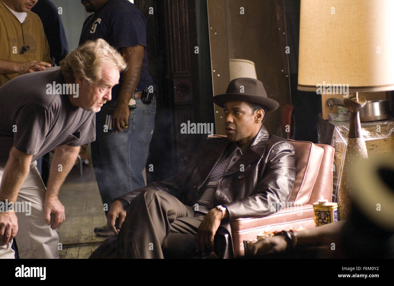 RELEASE DATE: November 2, 2007. MOVIE TITLE: American Gangster - STUDIO: Universal Pictures. PLOT: A drug lord smuggles heroin into Harlem during the 1970s by hiding the stash inside the coffins of American soldiers returning from Vietnam. PICTURED: Director/Producer RIDLEY SCOTT and DENZEL WASHINGTON as gangster Frank Lucas. Stock Photo