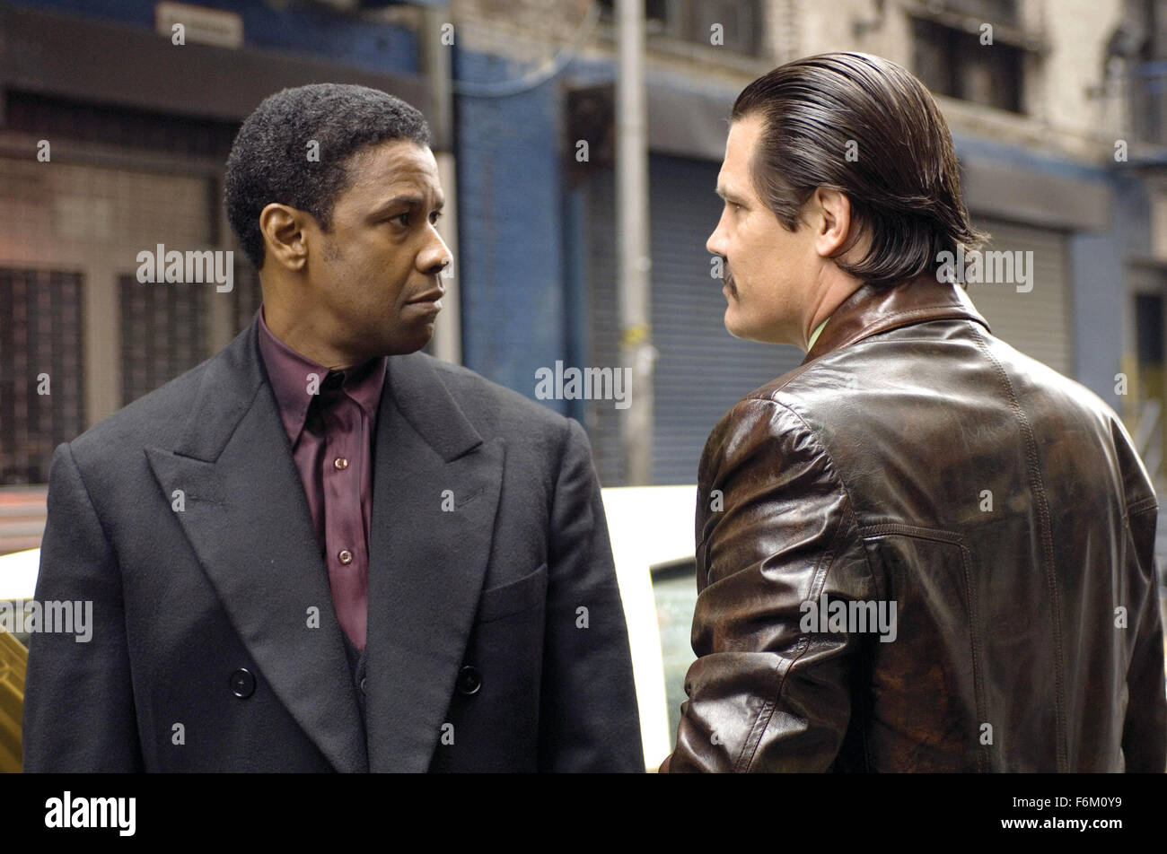 RELEASE DATE: November 2, 2007. MOVIE TITLE: American Gangster - STUDIO: Universal Pictures. PLOT: A drug lord smuggles heroin into Harlem during the 1970s by hiding the stash inside the coffins of American soldiers returning from Vietnam. PICTURED: Gangster Frank Lucas (DENZEL WASHINGTON) confronts crooked Detective Trupo (JOSH BROLIN). Stock Photo