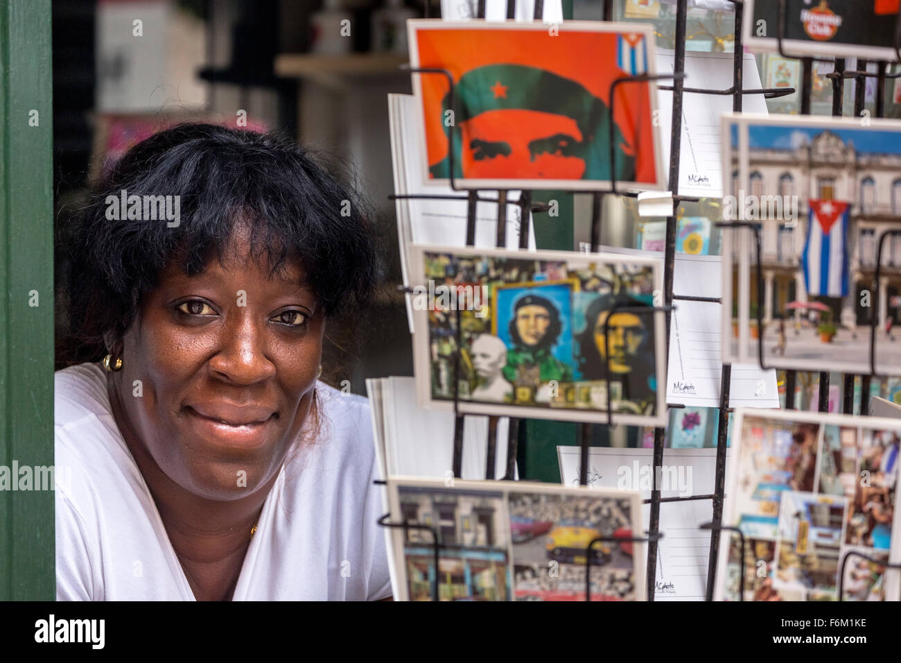Kiosk saleswoman, Cuban, Postcard stands with postcards of Ernesto Che Guevara, souvenirs, memories, La Habana, Cuba, Caribbean, Stock Photo