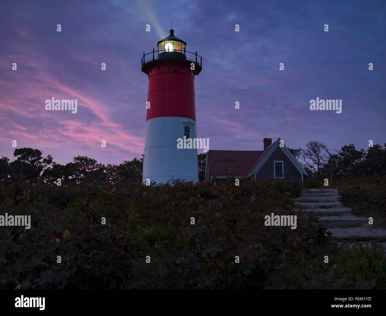 Nauset Light, a landmark red and white lighthouse at Nauset Light Beach ...