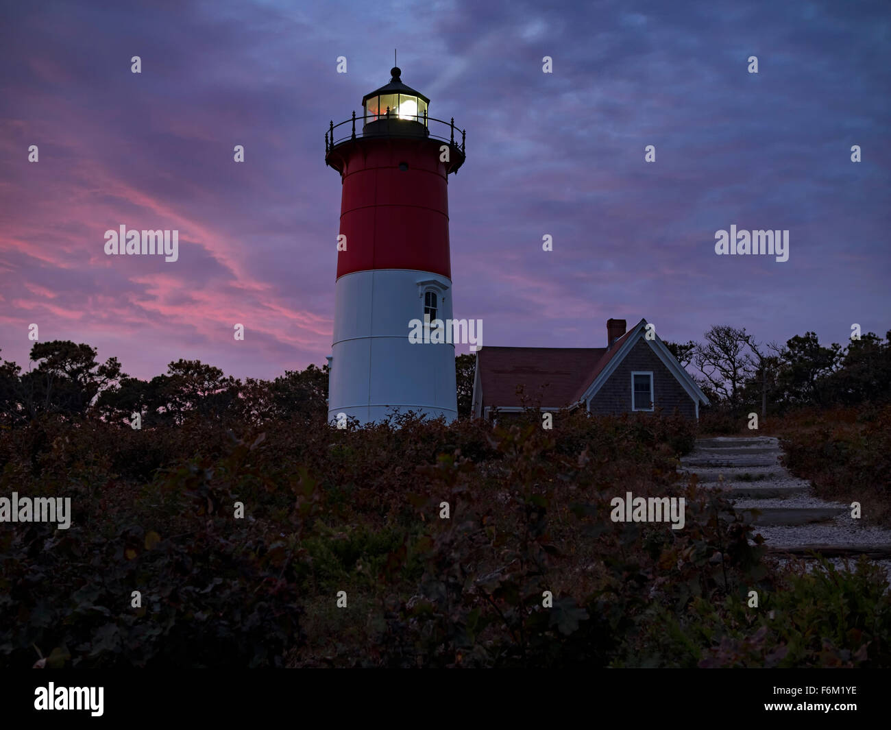 Nauset Light, a landmark red and white lighthouse at Nauset Light Beach ...